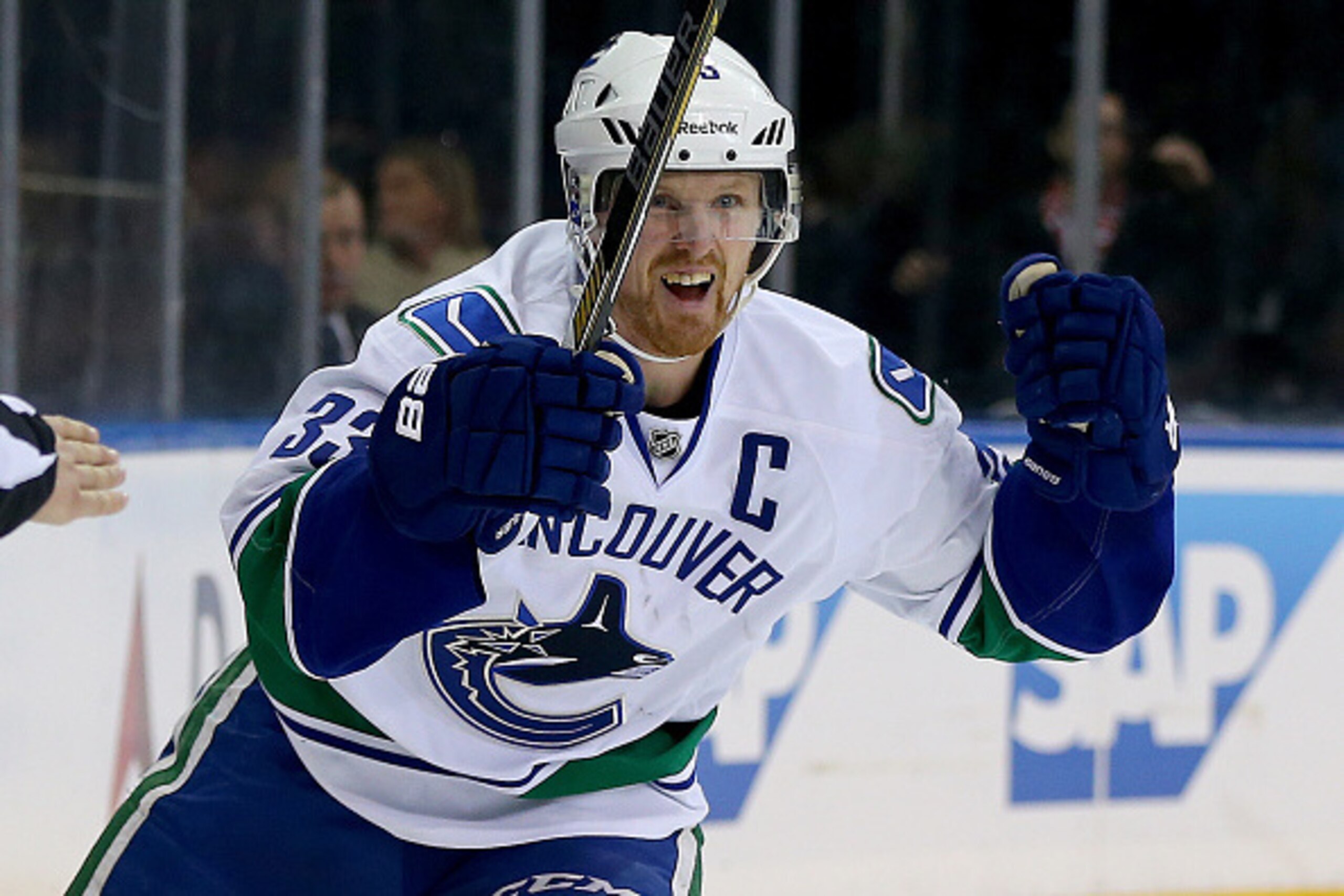 NEW YORK, NY - FEBRUARY 19:  Henrik Sedin #33 of the Vancouver Canucks celebrates his goal in the third period against the New York Rangers on February 19, 2015 at Madison Square Garden in New York City.The Vancouver Canucks defeated the New York Rangers 