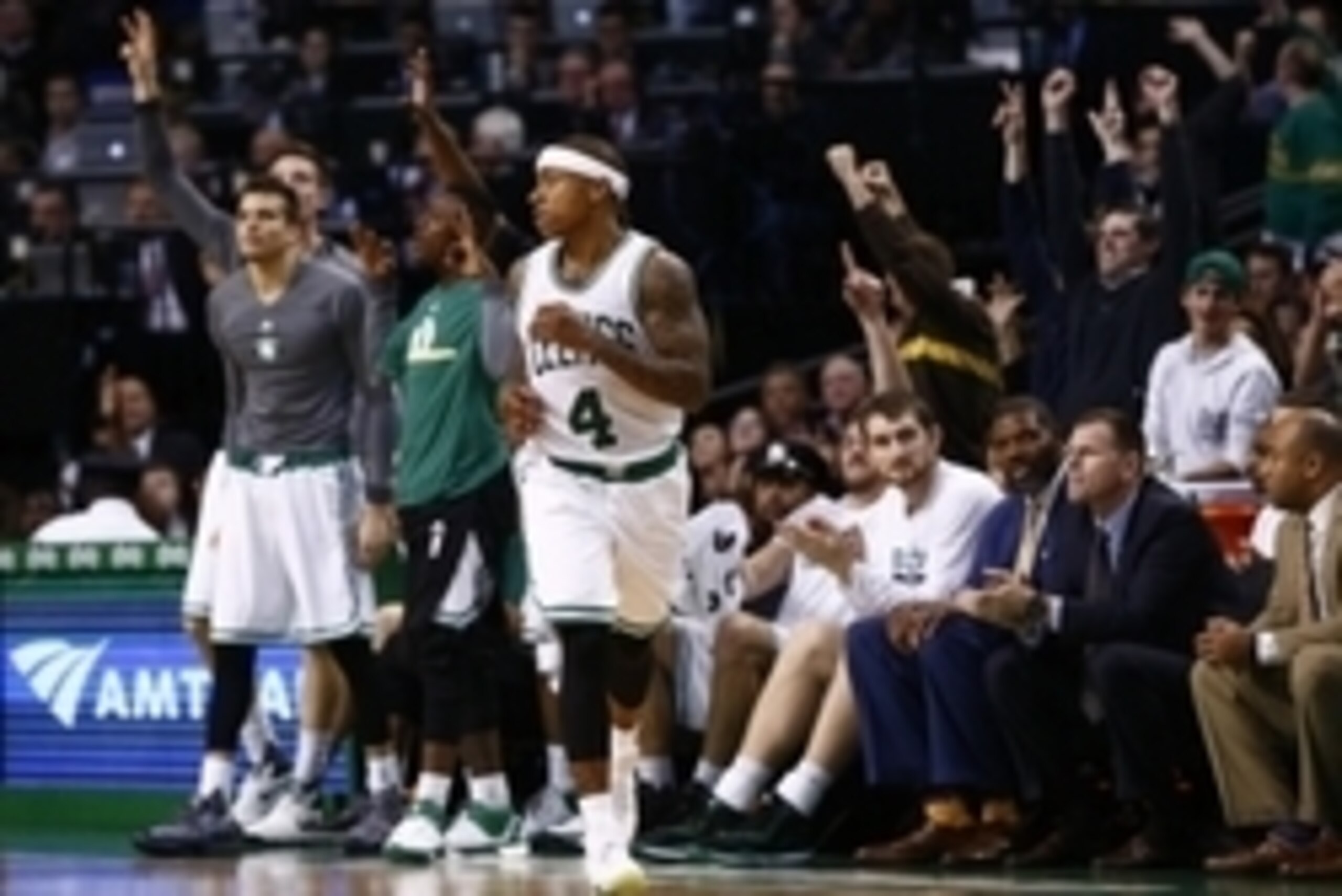 Nov 13, 2015; Boston, MA, USA; Boston Celtics guard Isaiah Thomas (4) celebrates after making a three-point basket against the Atlanta Hawks during the second half at TD Garden. Mandatory Credit: Mark L. Baer-USA TODAY Sports