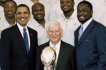 WASHINGTON  - MAY 21:  U.S. President Barack Obama (L) poses with Pittsburgh Steelers Chairman Dan Rooney (C) and Head Coach Mike Tomlin (R) during a picture with the 2009 NFL Super Bowl champion Pittsburgh Steelers in the East Room of the White House May