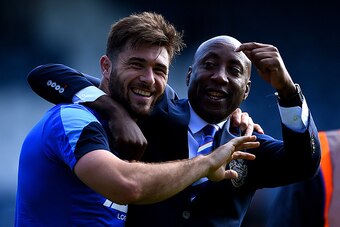 LONDON, ENGLAND - MAY 16:  Charlie Austin and Chris Ramsey of QPR are seen after the Barclays Premier League match between Queens Park Rangers and Newcastle United at Loftus Road on May 16, 2015 in London, England.  (Photo by Shaun Botterill/Getty Images)