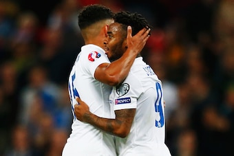 LONDON, ENGLAND - OCTOBER 09:  Raheem Sterling (R) of England celebrates scoring his sides second goal with team mate Alex Oxlade-Chamberlain of England during the UEFA EURO 2016 Group E qualifying match between England and Estonia at Wembley on October 9