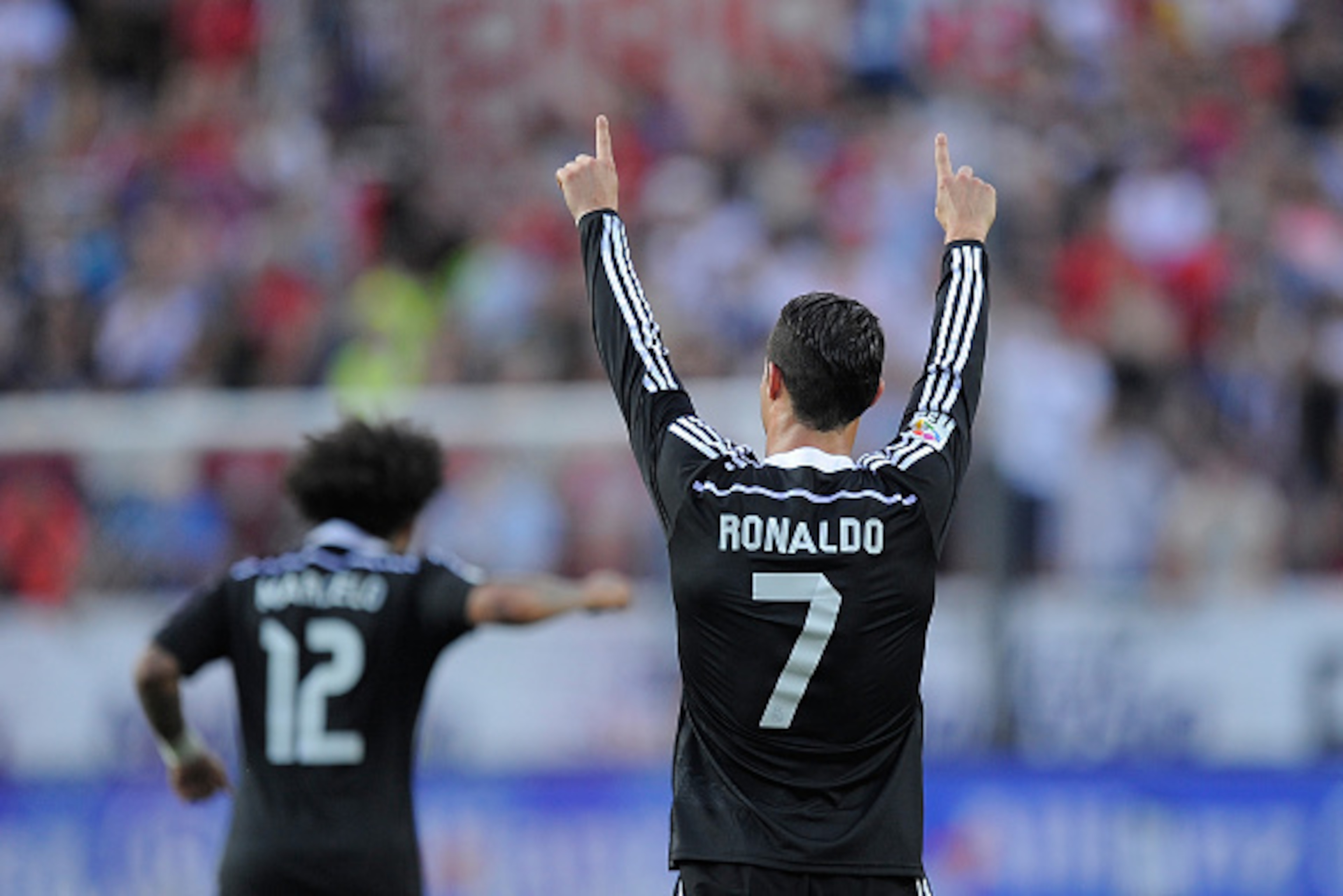 SEVILLE, SPAIN - MAY 02:  Cristiano Ronaldo of Real Madrid celebrates after scoring his team's 2nd goal during the La Liga match between Sevilla FC and Real Madrid CF at Estadio Ramon Sanchez Pizjuan on May 2, 2015 in Seville, Spain.  (Photo by Denis Doyl