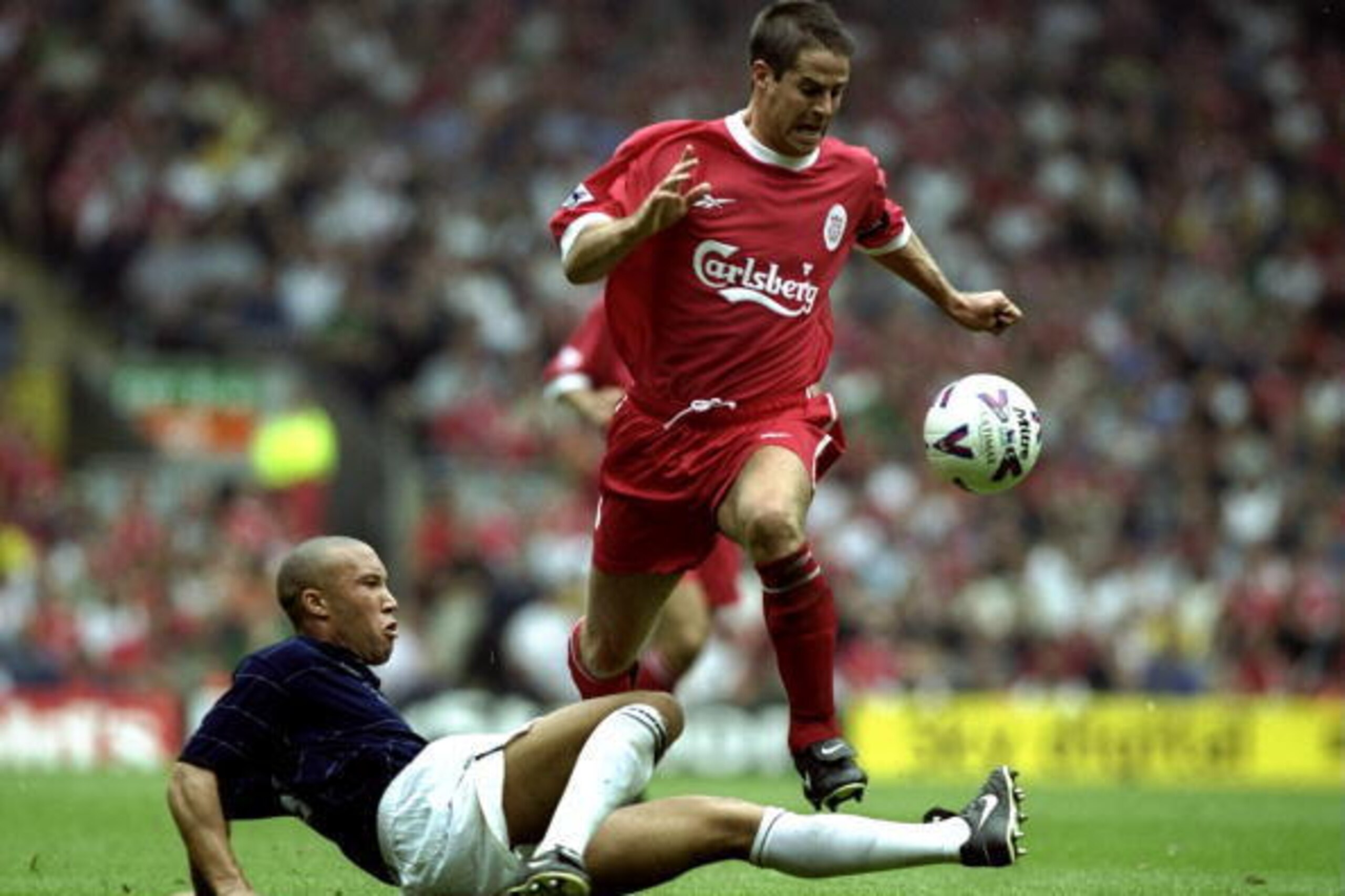 11 Sep 1999: Jamie Redknapp of Liverpool gets past Mickael Silvestre of Manchester United during the FA Carling Premiership match at Anfield in Liverpool, England. United won 3-2. \ Mandatory Credit: Ben Radford /Allsport 11 Sep 1999: Jamie Redknapp of Liverpool gets past Mickael Silvestre of Manchester United during the FA Carling Premiership match at Anfield in Liverpool, England. United won 3-2. \ Mandatory Credit: Ben Radford /Allsport