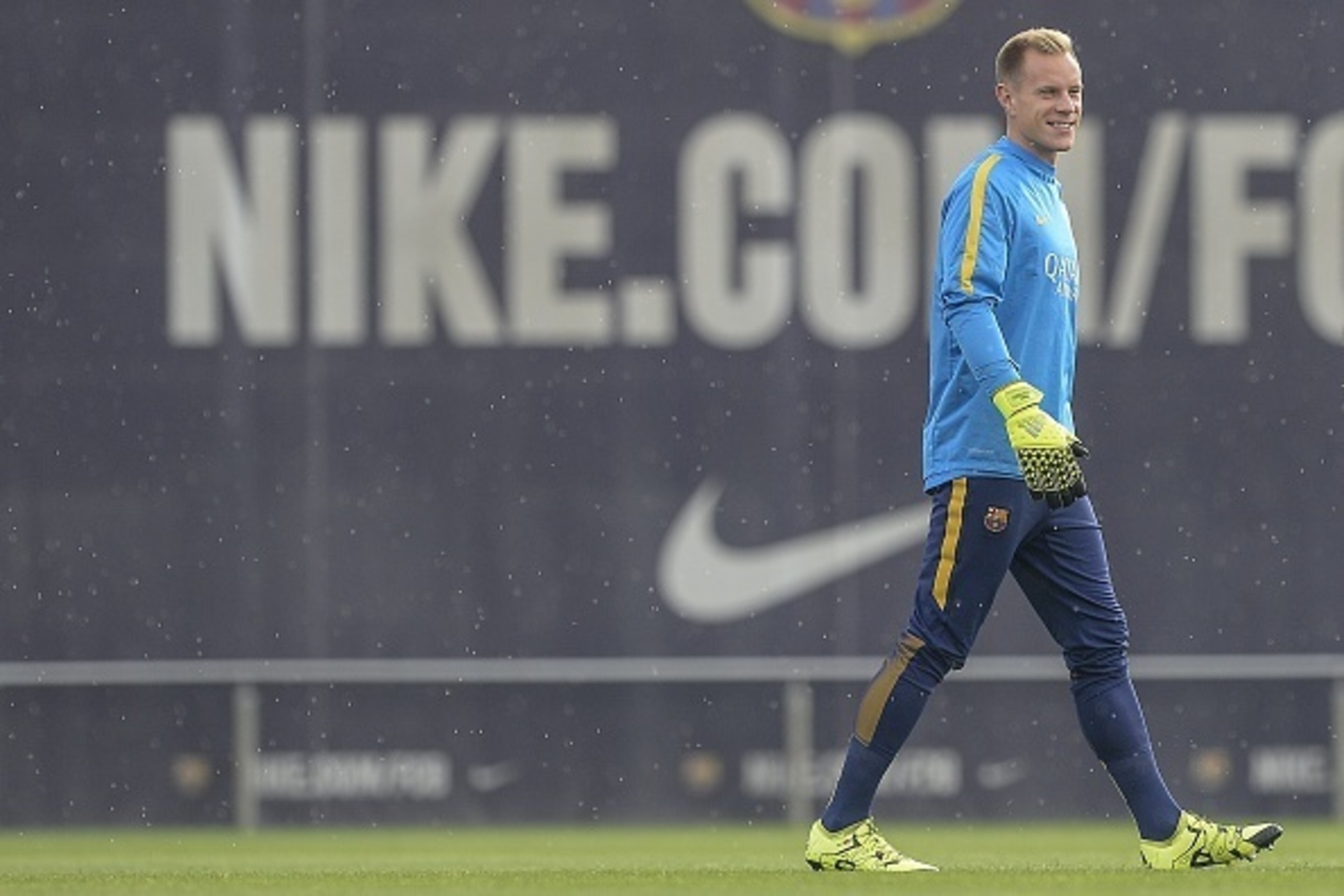 Barcelona's German goalkeeper Marc-Andre ter Stegen walks  in a training session at the Sports Center FC Barcelona Joan Gamper in Sant Joan Despi, near Barcelona on August 22, 2015 on the eve of the first Spanish League 'La Liga'  football match against A