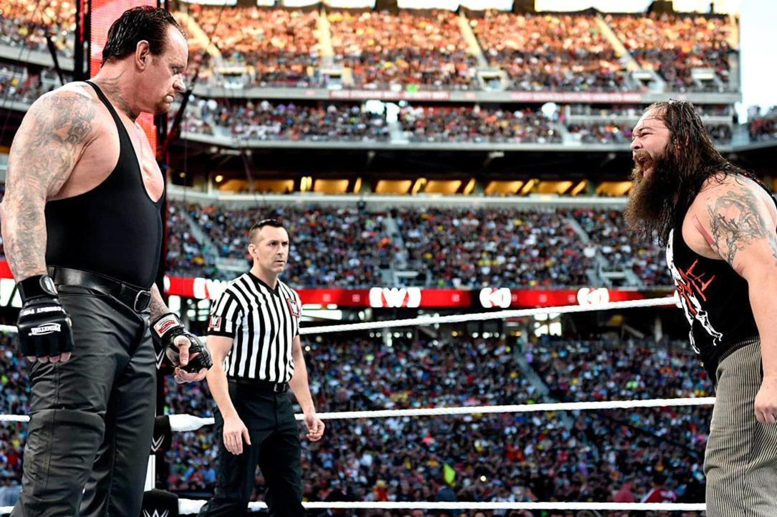 Undertaker and Bray Wyatt face off at WrestleMania 31. Undertaker and Bray Wyatt face off at WrestleMania 31.