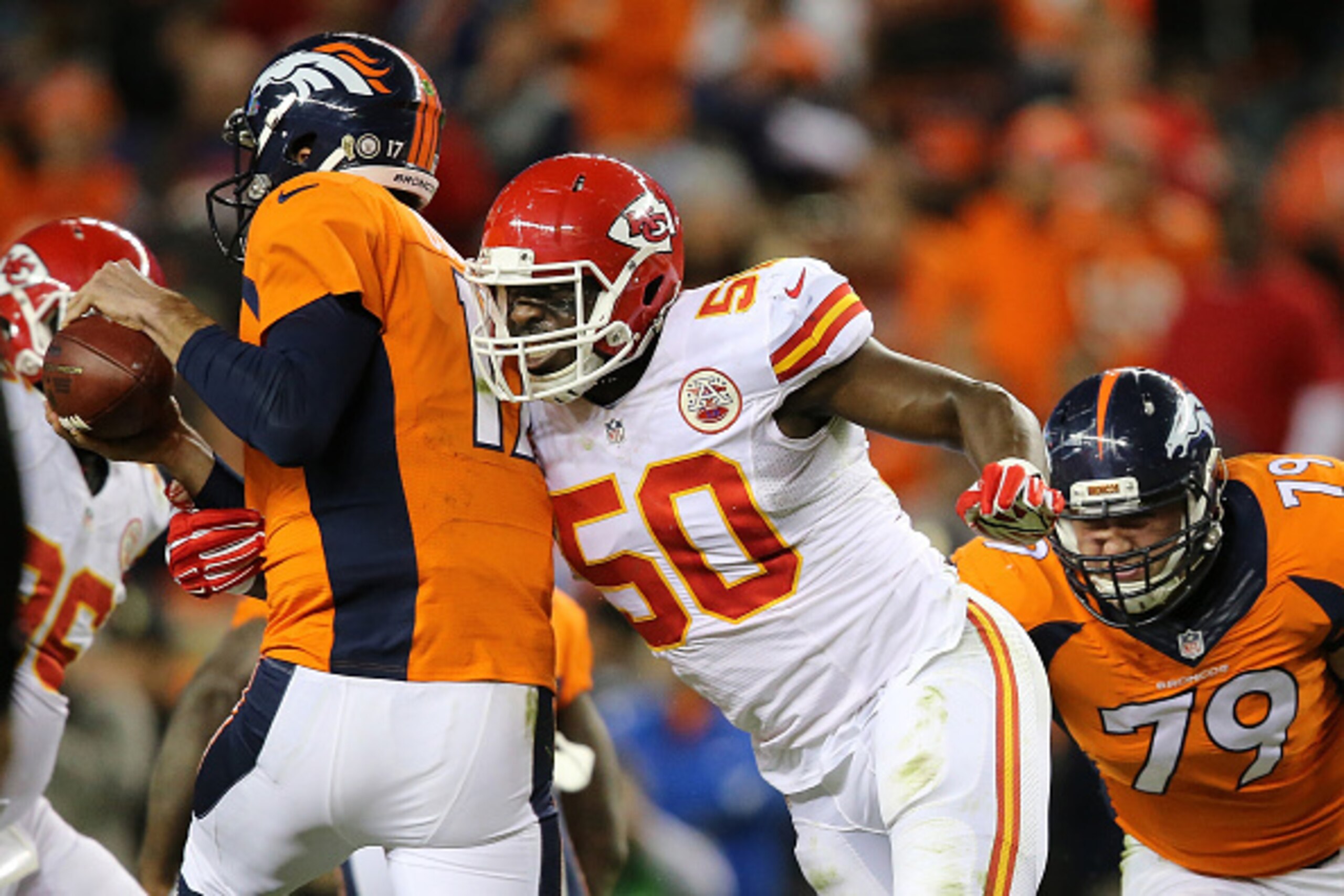 DENVER, CO - NOVEMBER 15: Linebacker Justin Houston #50 of the Kansas City Chiefs beats the block of Michael Schofield #79 of the Denver Broncos to get to quarterback Brock Osweiler #17 of the Denver Broncos at Sports Authority Field at Mile High on Nove DENVER, CO - NOVEMBER 15: Linebacker Justin Houston #50 of the Kansas City Chiefs beats the block of Michael Schofield #79 of the Denver Broncos to get to quarterback Brock Osweiler #17 of the Denver Broncos at Sports Authority Field at Mile High on Nove
