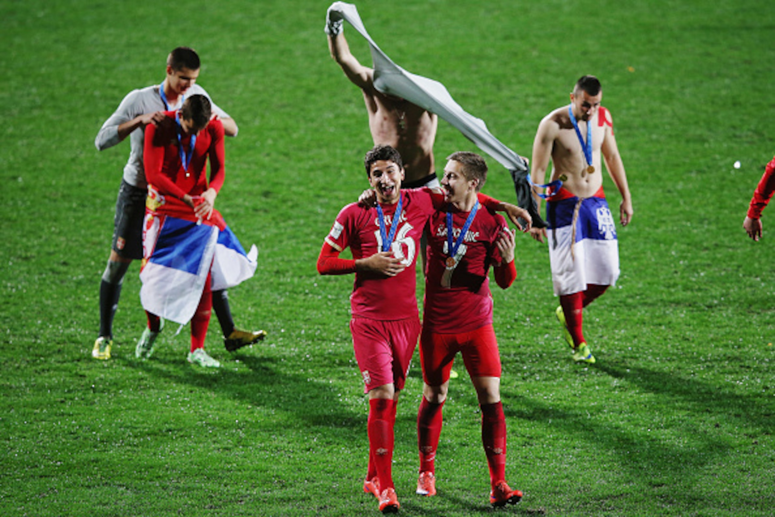 AUCKLAND, NEW ZEALAND - JUNE 20:  Marko Grujic of Serbia and Ivan Saponjic of Serbia celebrate after winning the FIFA U-20 World Cup Final match between Brazil and Serbia at North Harbour Stadium on June 20, 2015 in Auckland, New Zealand.  (Photo by Hanna