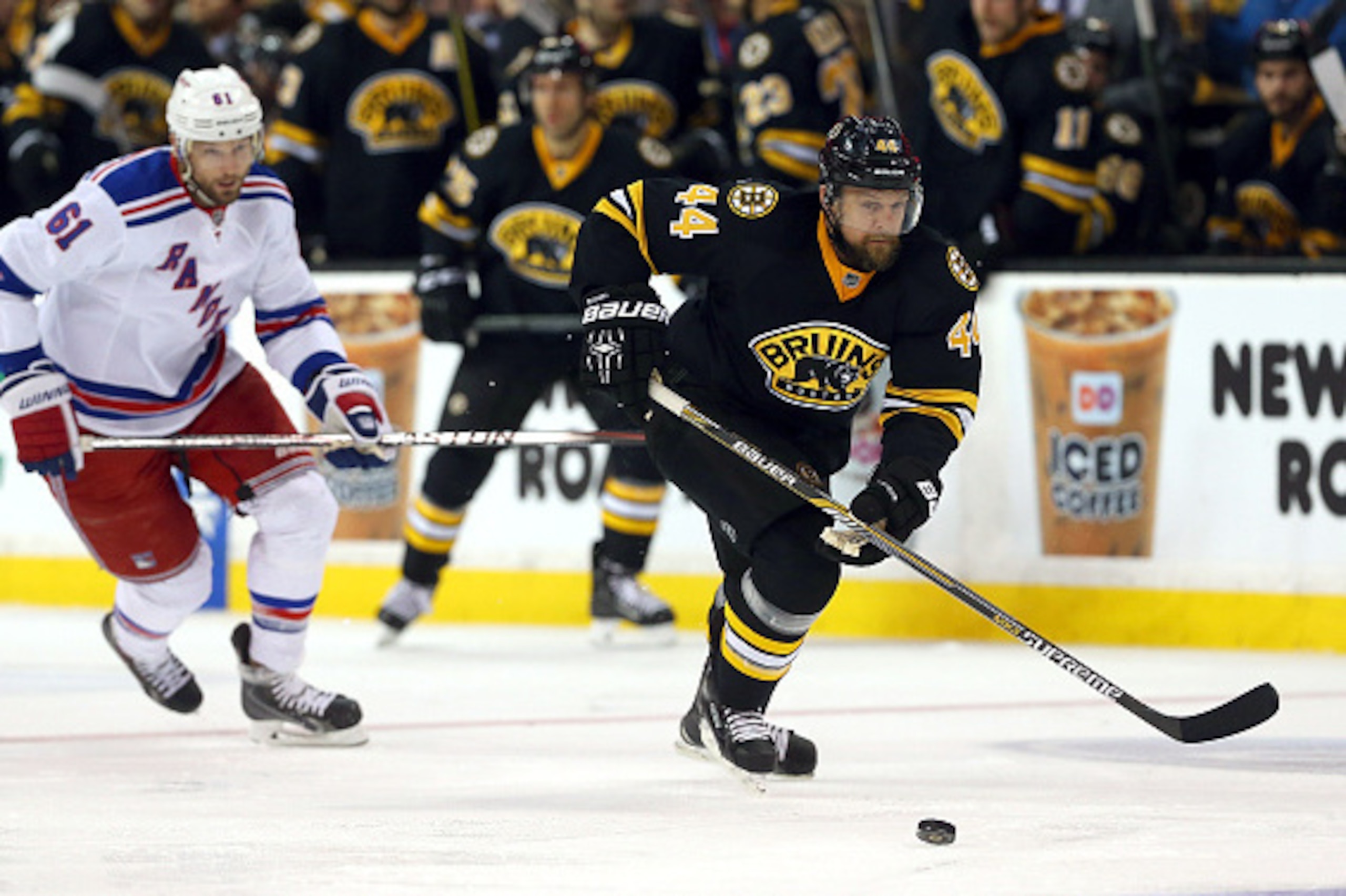 BOSTON, MA - MARCH 28:  Dennis Seidenberg #44 of the Boston Bruins keeps the puck from Rick Nash #61 of the New York Rangers in the first period at the TD Garden on March 28, 2015 in Boston, Massachusetts.  (Photo by Jim Rogash/Getty Images)