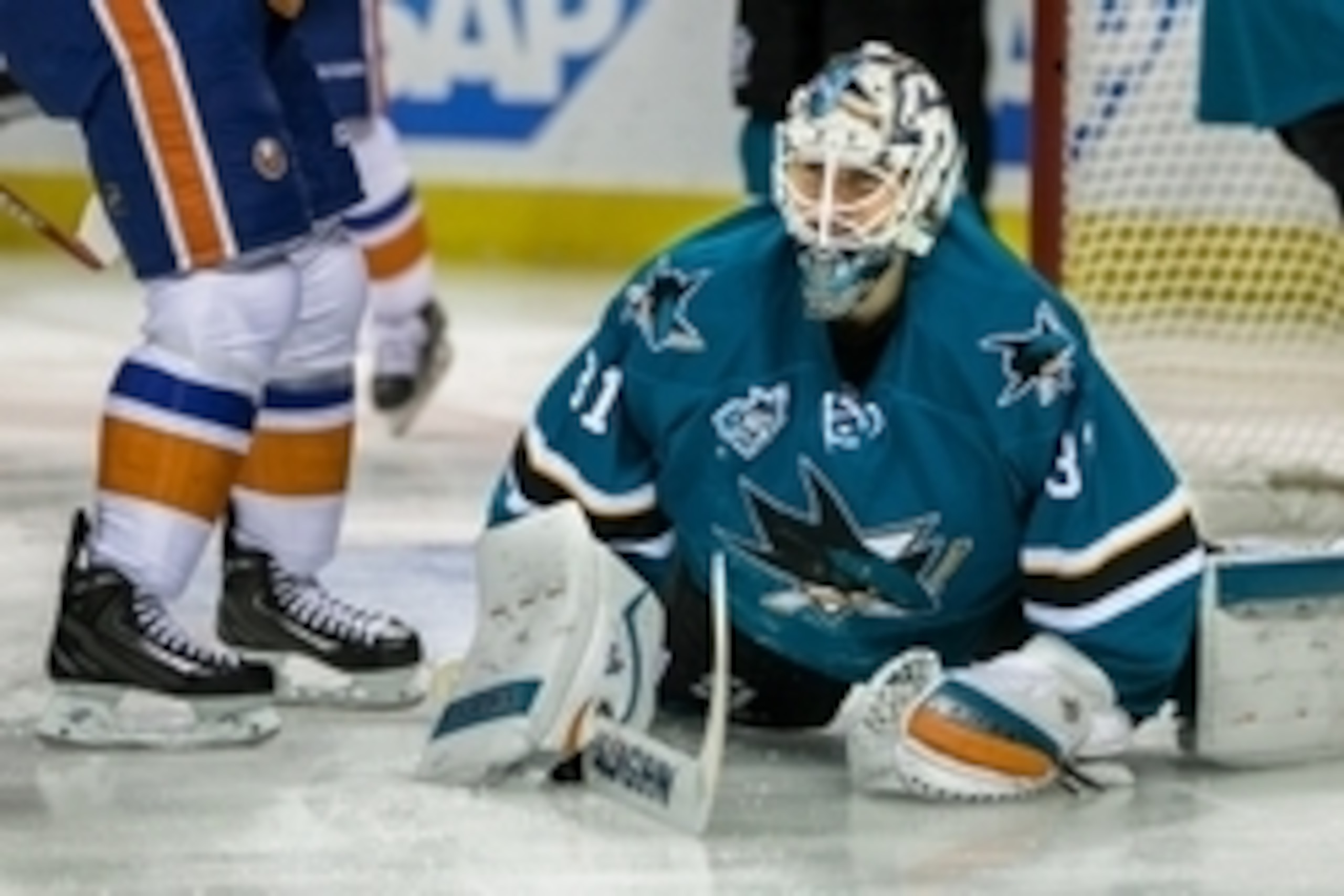 Nov 10, 2015; San Jose, CA, USA;  San Jose Sharks goalie Martin Jones (31) reacts after New York Islanders center John Tavares (91) scored in the first minute of the game at SAP Center at San Jose. Mandatory Credit: John Hefti-USA TODAY Sports.