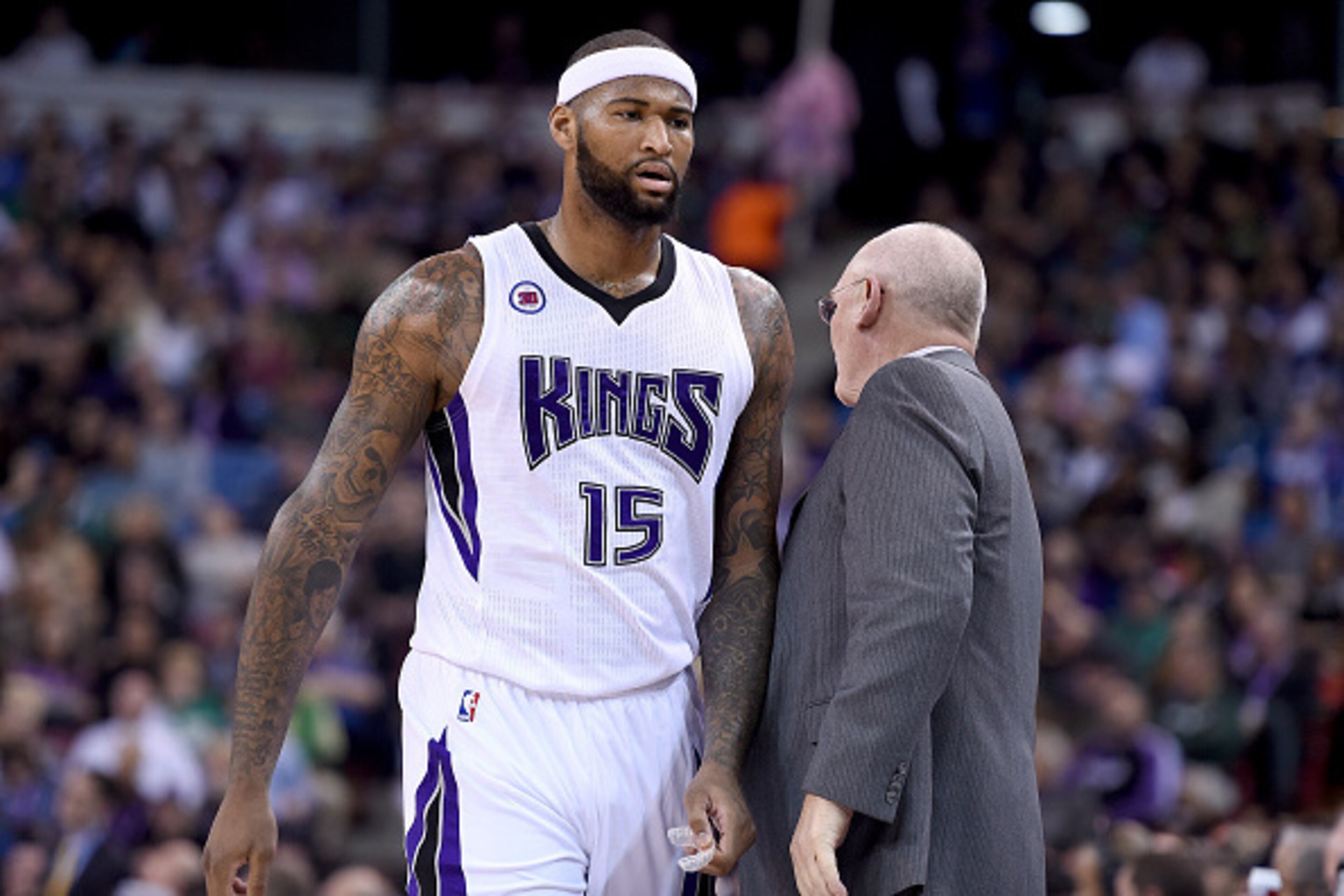 SACRAMENTO, CA - FEBRUARY 20: DeMarcus Cousins #15 of the Sacramento Kings walks back to the bench past head coach George Karl after Cousins was called for a technical foul against the Boston Celtics in the first quarter at Sleep Train Arena on February SACRAMENTO, CA - FEBRUARY 20: DeMarcus Cousins #15 of the Sacramento Kings walks back to the bench past head coach George Karl after Cousins was called for a technical foul against the Boston Celtics in the first quarter at Sleep Train Arena on February