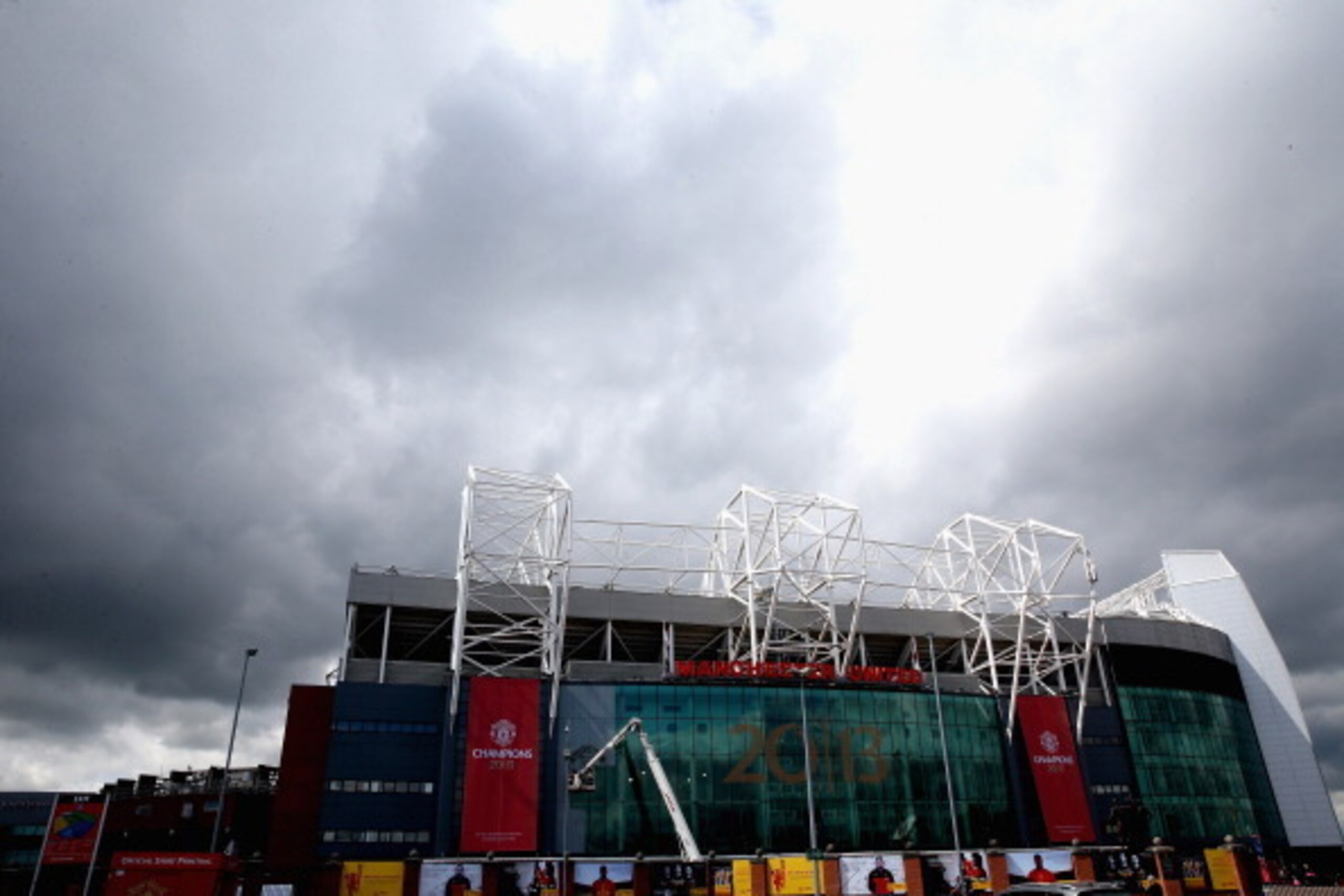 MANCHESTER, ENGLAND - MAY 08:  Rain clouds over Old Trafford on the day Manchester United manager Sir Alex Ferguson announced his retirement as club manager on May 8, 2013 in Manchester, England.  (Photo by Clive Brunskill/Getty Images)