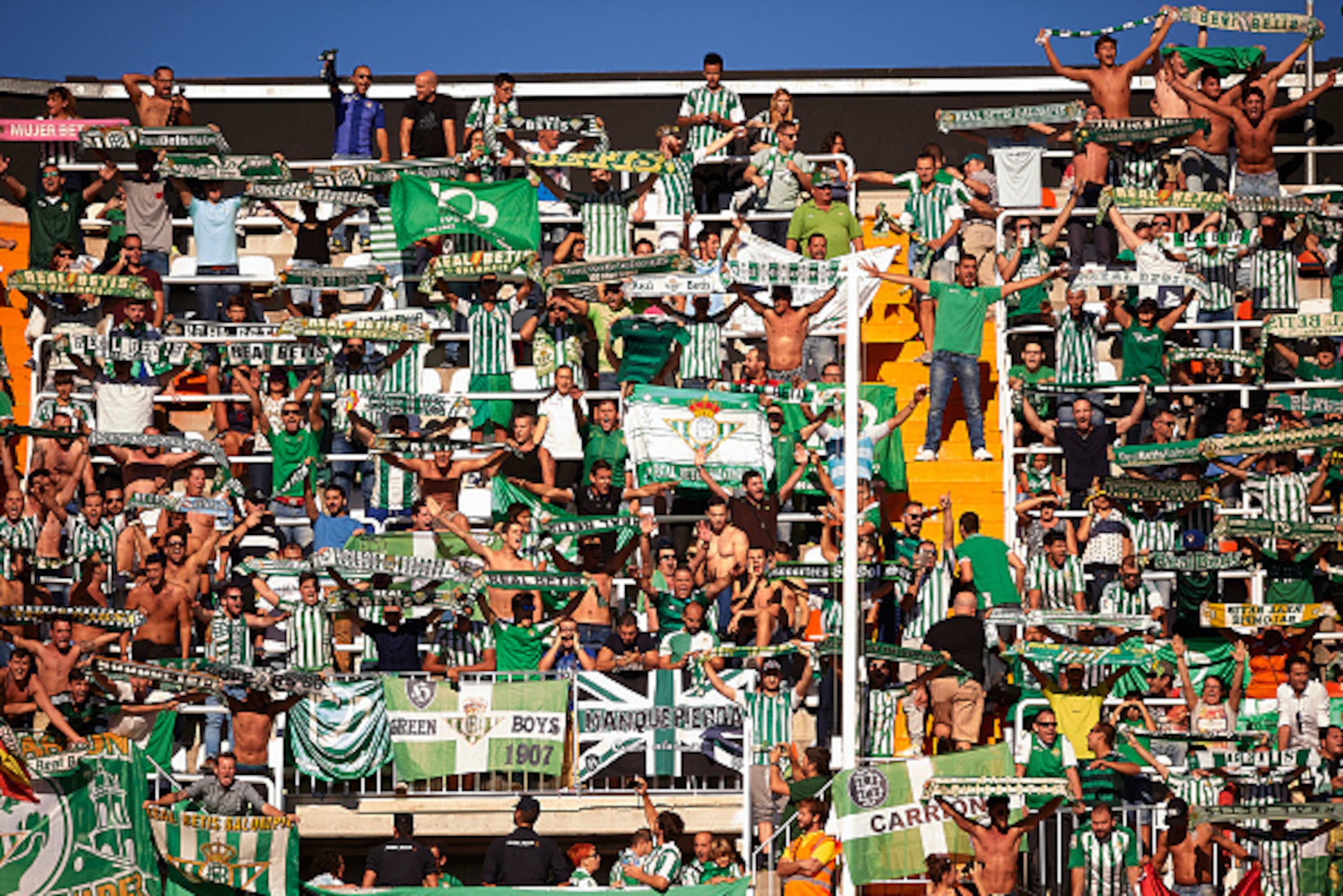 VALENCIA, SPAIN - SEPTEMBER 19:  Real Betis Balompie supporters cheer on their team during the La Liga match between Valencia CF and Real Betis Balompie at Estadi de Mestalla on September 19, 2015 in Valencia, Spain.  (Photo by Manuel Queimadelos Alonso/G