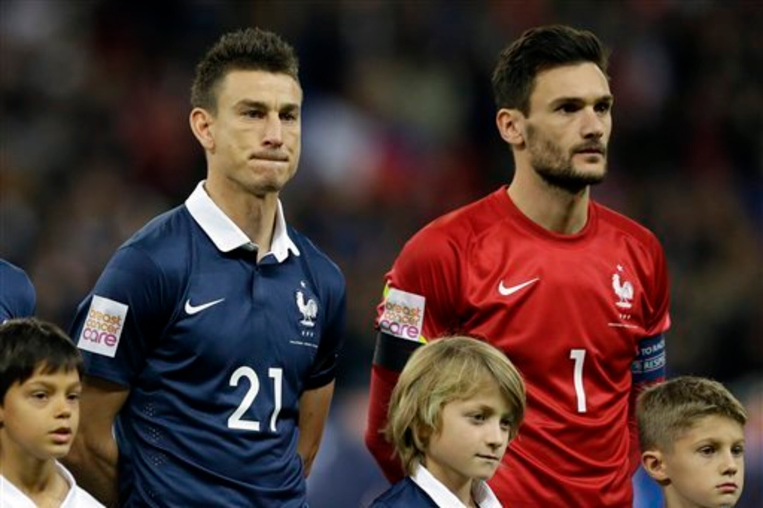 Koscielny (left) was emotional before the game against England.