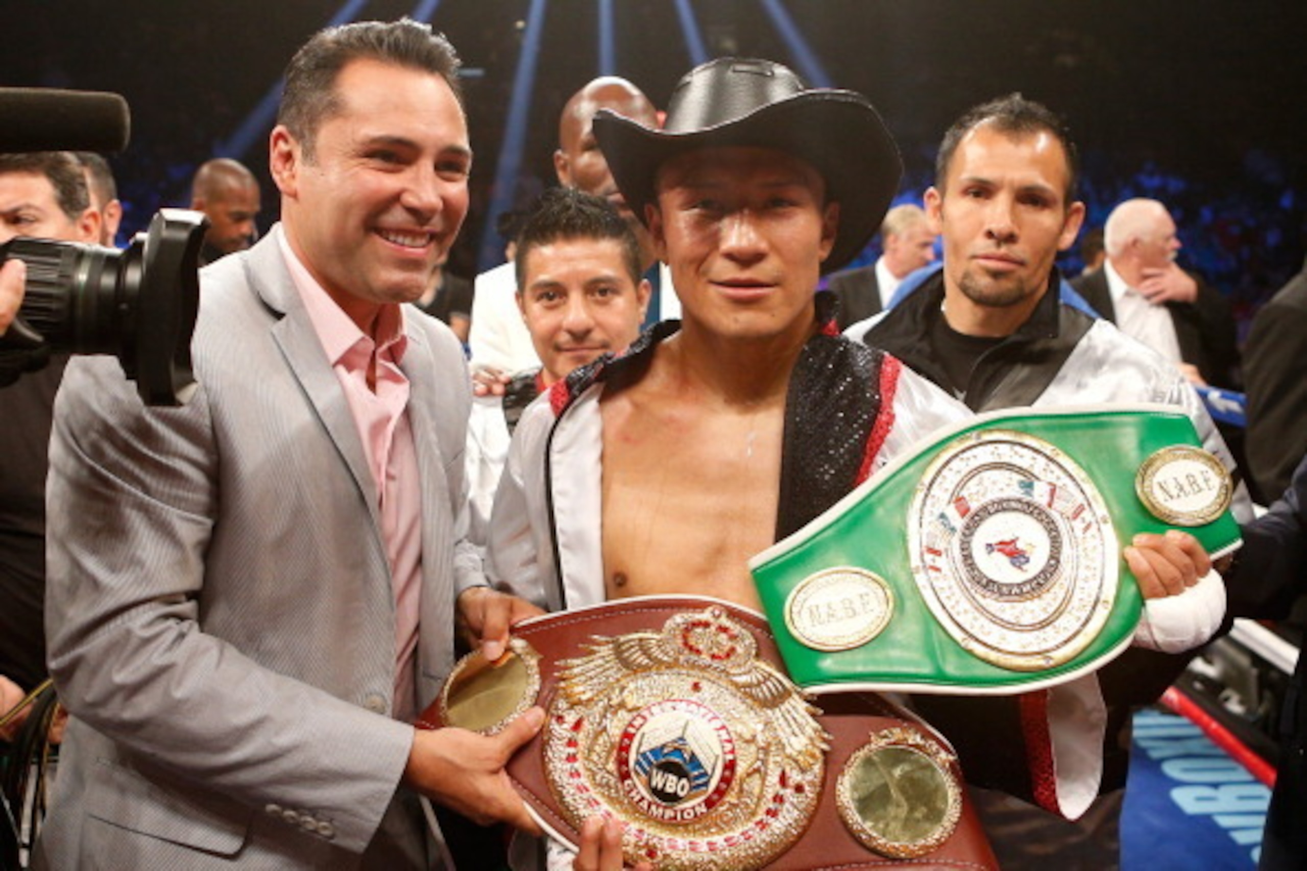 LAS VEGAS, NV - JULY 12:  Francisco Vargas poses with President of Golden Boy Promotions Oscar De La Hoya after his TKO victory over Juan Manuel Lopez during their super featherweight bout at the MGM Grand Garden Arena on July 12, 2014 in Las Vegas, Nevad