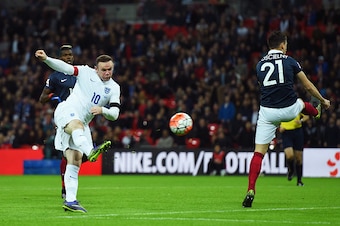 LONDON, ENGLAND - NOVEMBER 17: Wayne Rooney of England scores his team's second goal during the International Friendly match between England and France at Wembley Stadium on November 17, 2015 in London, England.  (Photo by Shaun Botterill/Getty Images)