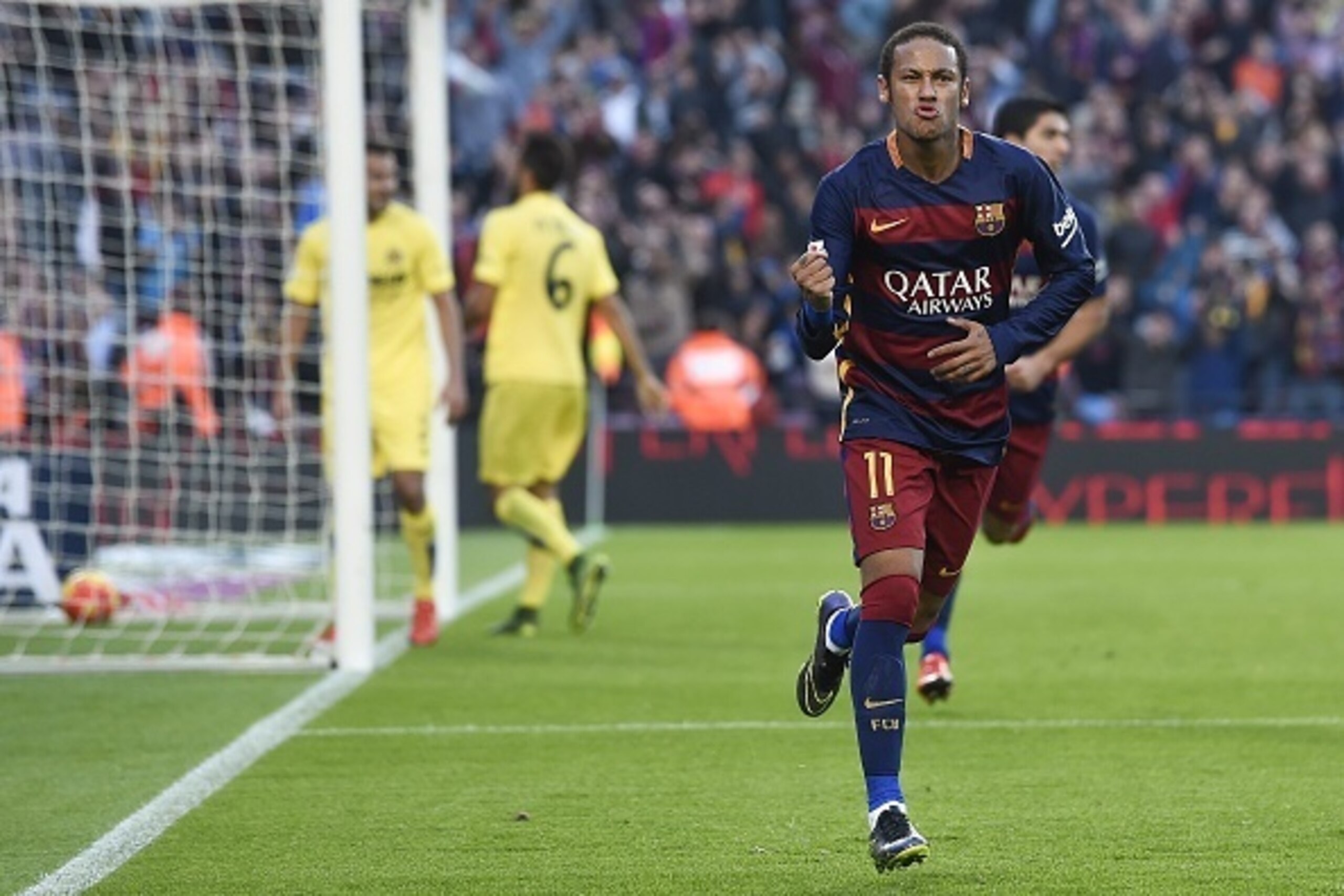 Barcelona's Brazilian forward Neymar da Silva Santos Junior celebrates his goal during the Spanish league football match FC Barcelona vs Villarreal CF at the Camp Nou stadium in Barcelona on November 8, 2015.   AFP PHOTO/ JOSEP LAGO        (Photo credit s