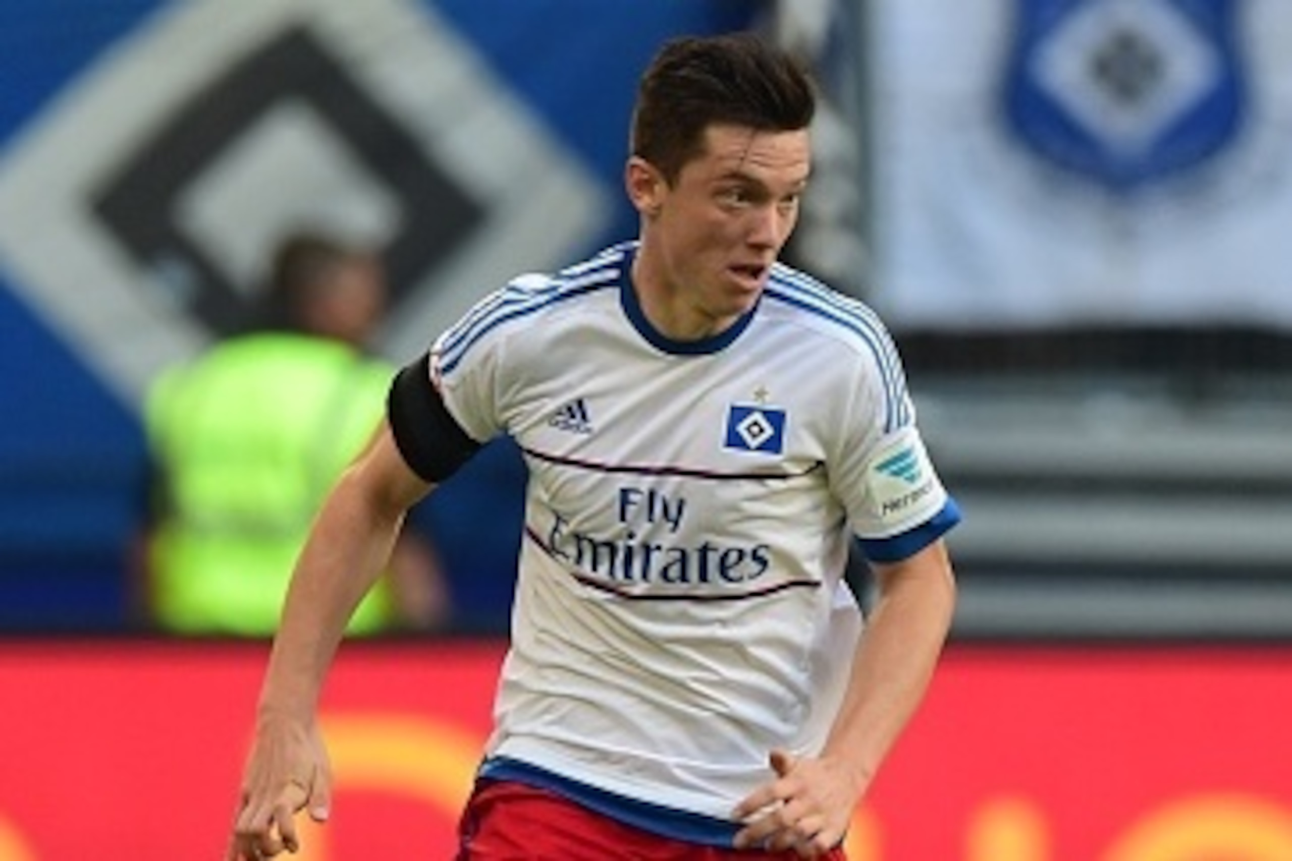 Hamburg's Latvian striker Michael Gregoritsch runs with the ball during the German first division Bundesliga football match Hamburger SV vs VfB Stuttgart, on August 22, 2015 in Hamburg, northern Germany.  Hamburg wins 3-2. AFP PHOTO / JOHN MACDOUGALL

RES
