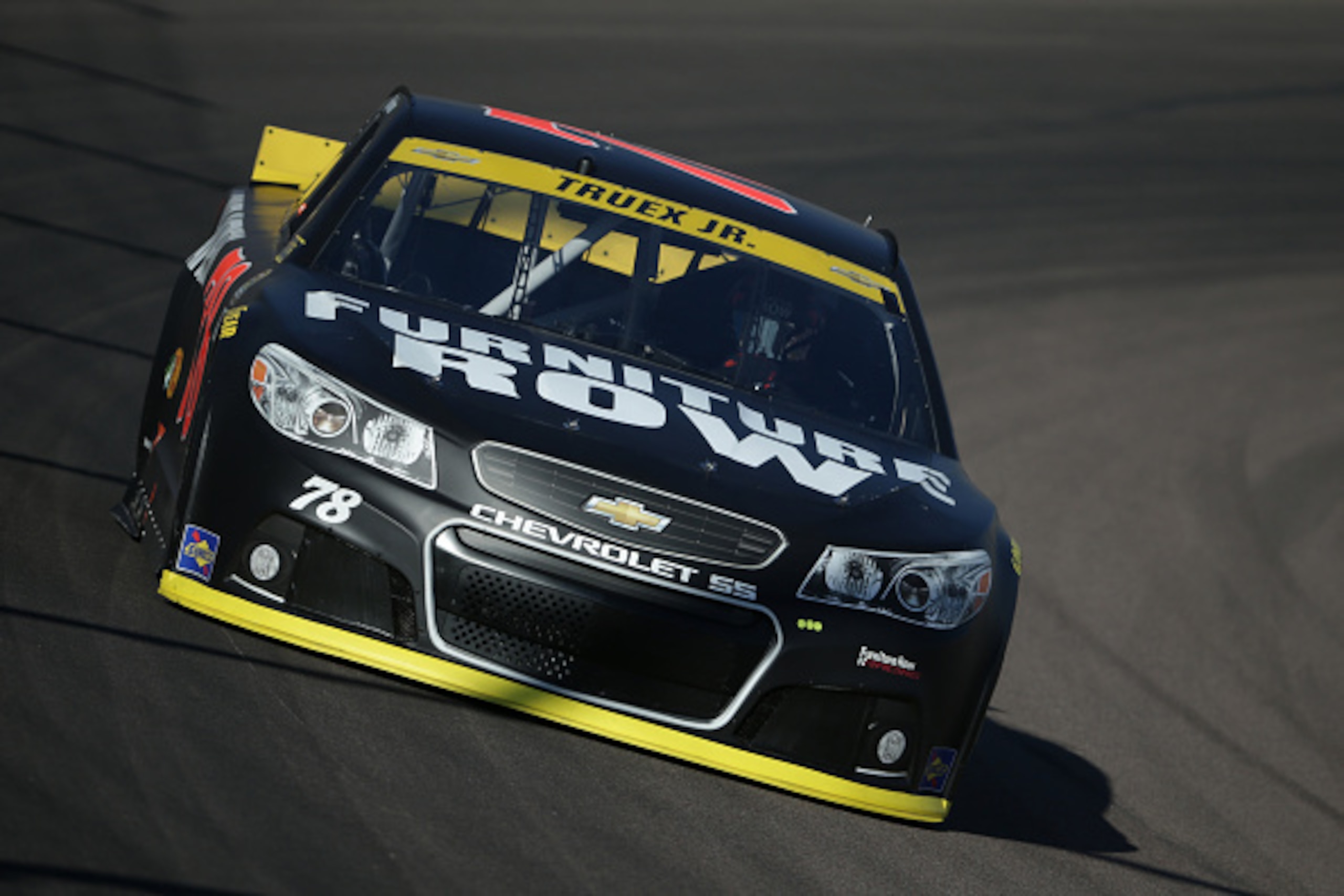 AVONDALE, AZ - NOVEMBER 14:  Martin Truex Jr., driver of the #78 Furniture Row/Visser Precision Chevrolet, drives during practice for the NASCAR Sprint Cup Series Quicken Loans Race for Heroes 500 at Phoenix International Raceway on November 14, 2015 in A