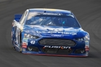 Aug 2, 2015; Long Pond, PA, USA; NASCAR Sprint Cup Series driver Aric Almirola (43) races during the Windows 10 400 at Pocono Raceway. Mandatory Credit: Matthew O'Haren-USA TODAY Sports