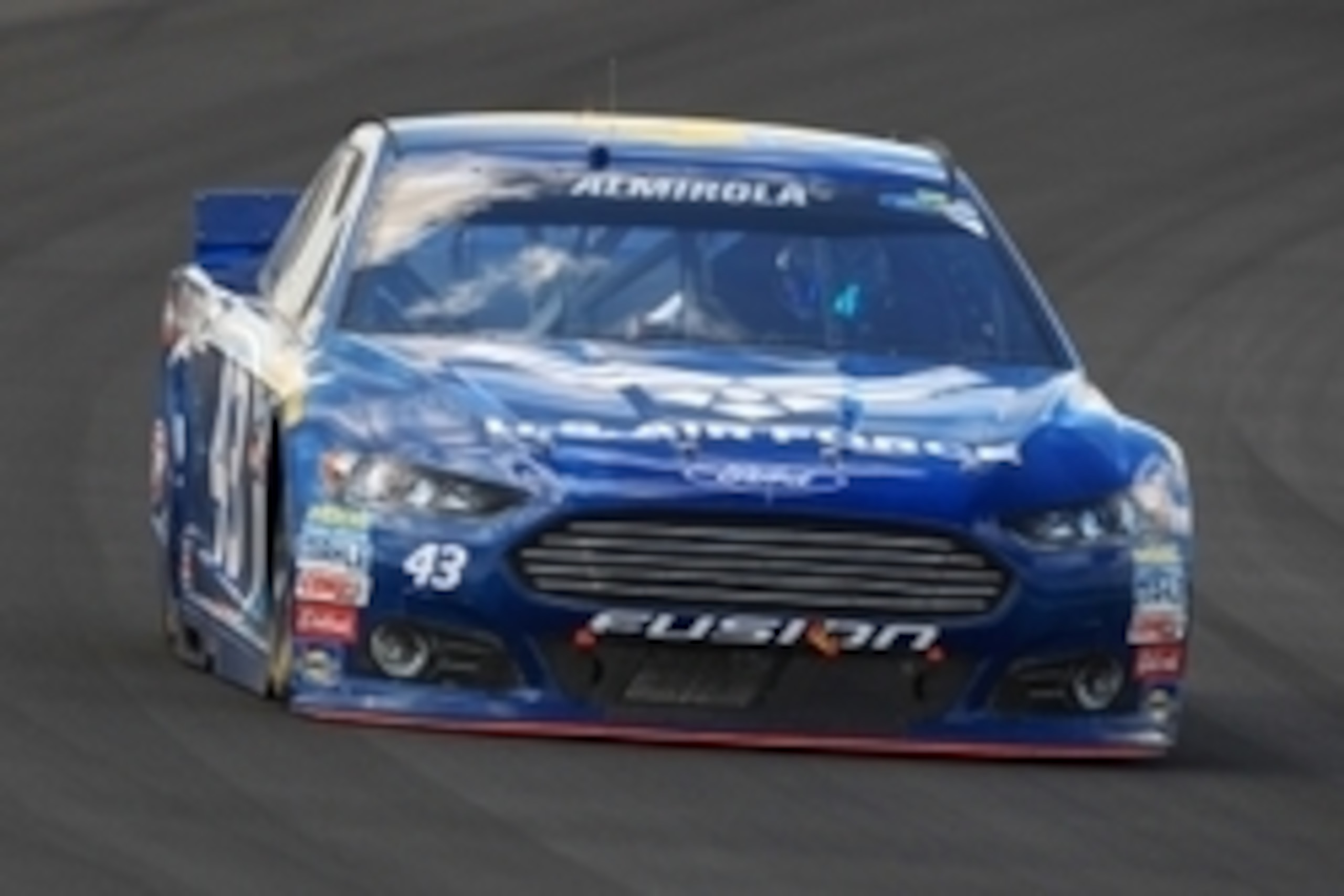 Aug 2, 2015; Long Pond, PA, USA; NASCAR Sprint Cup Series driver Aric Almirola (43) races during the Windows 10 400 at Pocono Raceway. Mandatory Credit: Matthew O'Haren-USA TODAY Sports