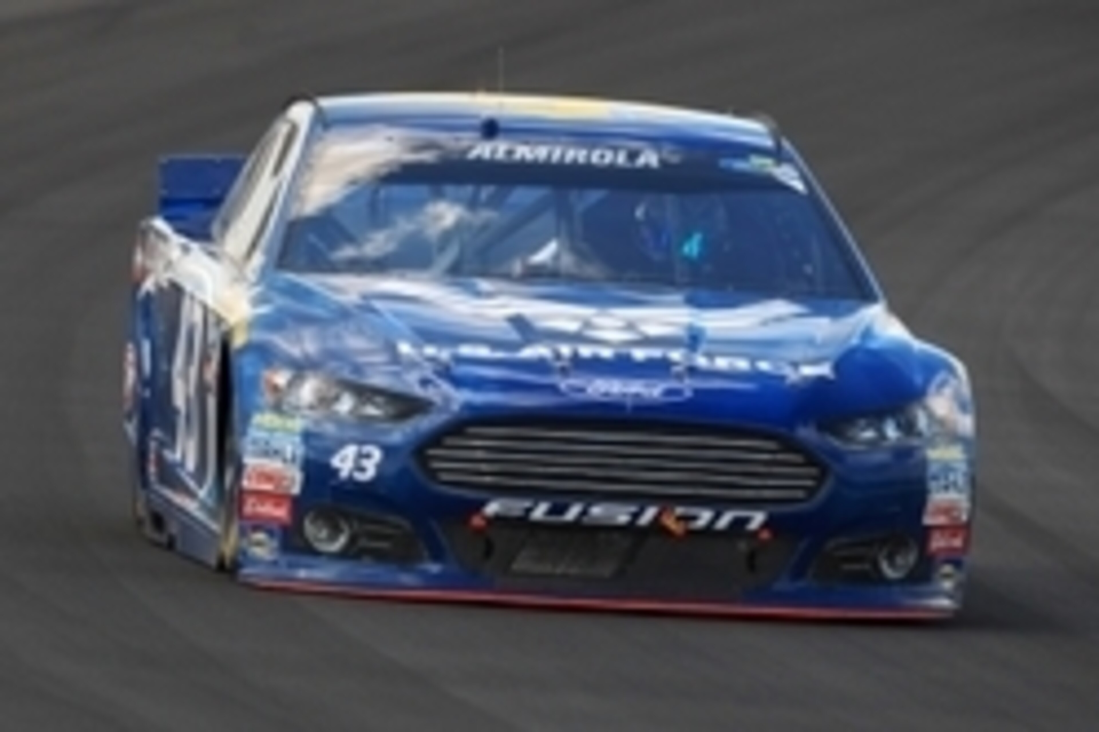 Aug 2, 2015; Long Pond, PA, USA; NASCAR Sprint Cup Series driver Aric Almirola (43) races during the Windows 10 400 at Pocono Raceway. Mandatory Credit: Matthew O'Haren-USA TODAY Sports