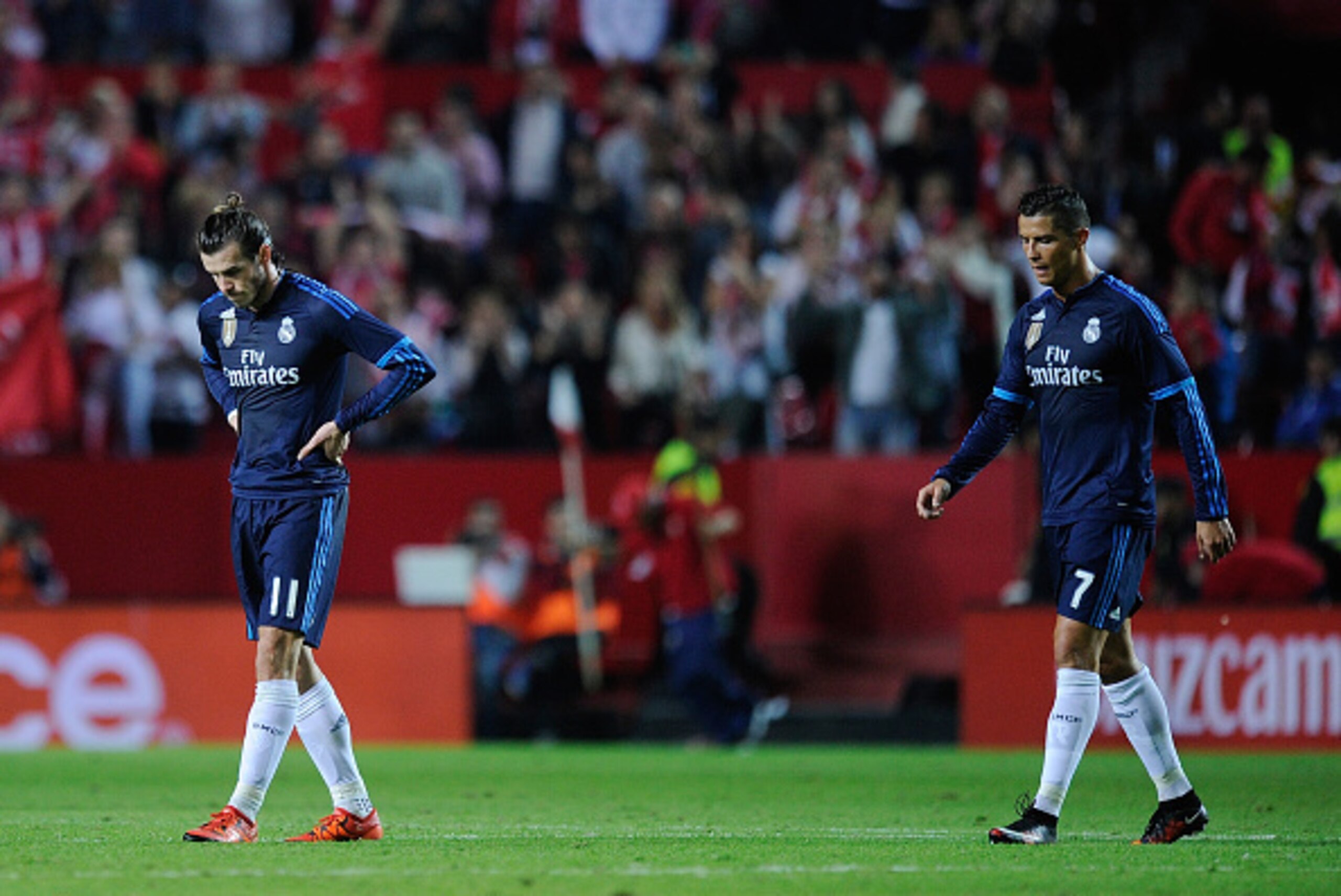 SEVILLE, SPAIN - NOVEMBER 08:  Cristiano Ronaldo and Gareth Bale of Real Madrid leaves the field after losing 3-2 to Sevilla  during the La Liga match between Sevilla FC and Real Madrid CF at Estadio Ramon Sanchez Pizjuan on November 8, 2015 in Seville, S