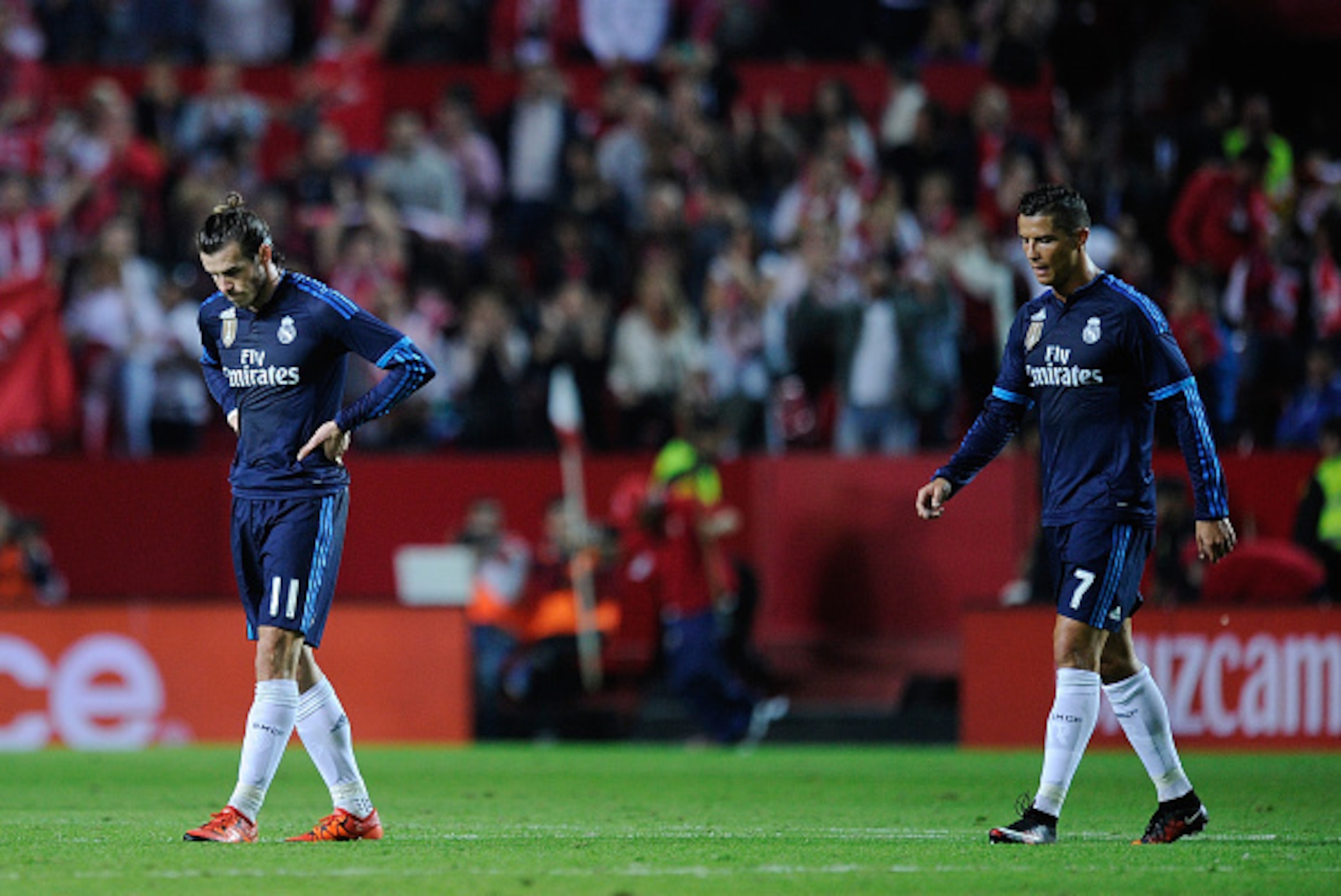SEVILLE, SPAIN - NOVEMBER 08:  Cristiano Ronaldo and Gareth Bale of Real Madrid leaves the field after losing 3-2 to Sevilla  during the La Liga match between Sevilla FC and Real Madrid CF at Estadio Ramon Sanchez Pizjuan on November 8, 2015 in Seville, S