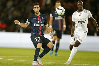PARIS, FRANCE - SEPTEMBER 22: Javier Pastore of PSG in action during the French Ligue 1 match between Paris Saint-Germain FC (PSG) and EA Guingamp at Parc des Princes stadium on September 22, 2015 in Paris, France. (Photo by Jean Catuffe/Getty Images)