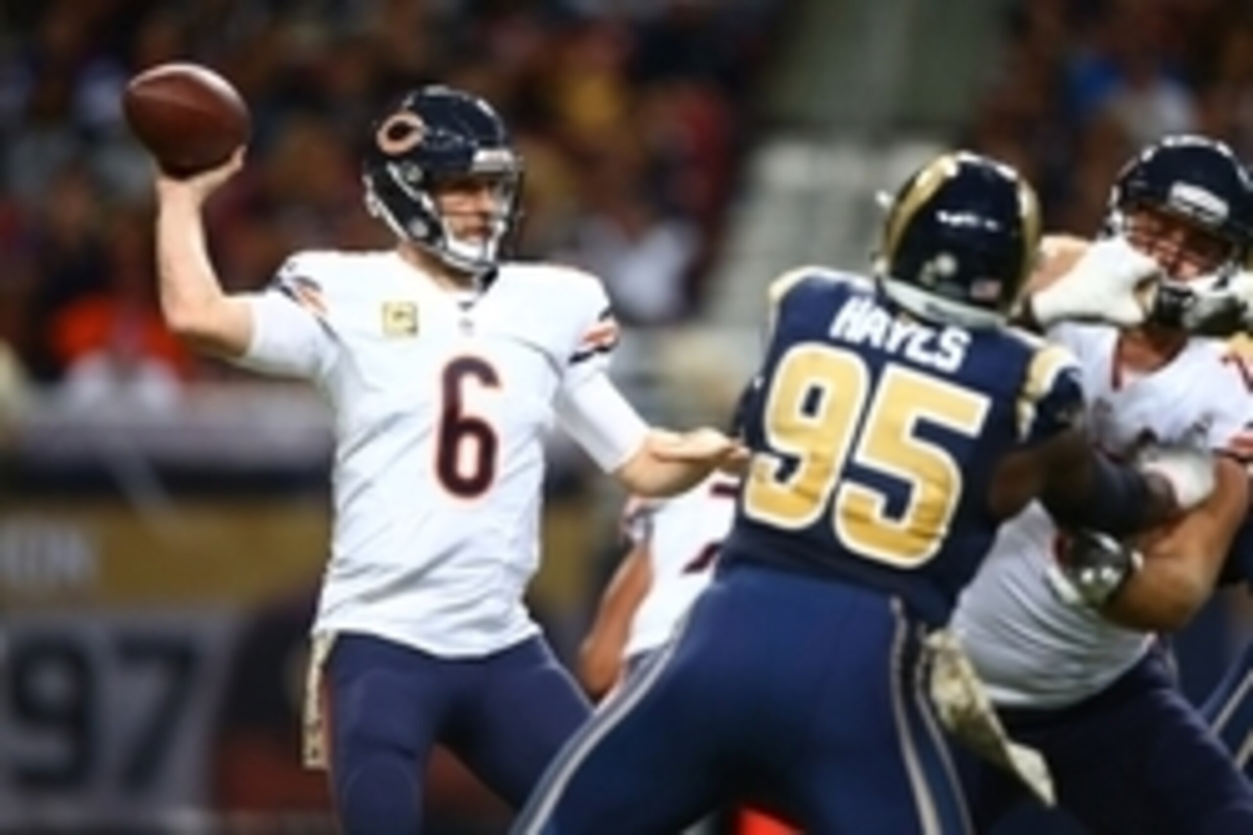 Nov 15, 2015; St. Louis, MO, USA; Chicago Bears quarterback Jay Cutler (6) drops back for a pass as he is pressured by St. Louis Rams defensive end William Hayes (95) during the second half at the Edward Jones Dome. The Bears won the game 37-13. Mandatory