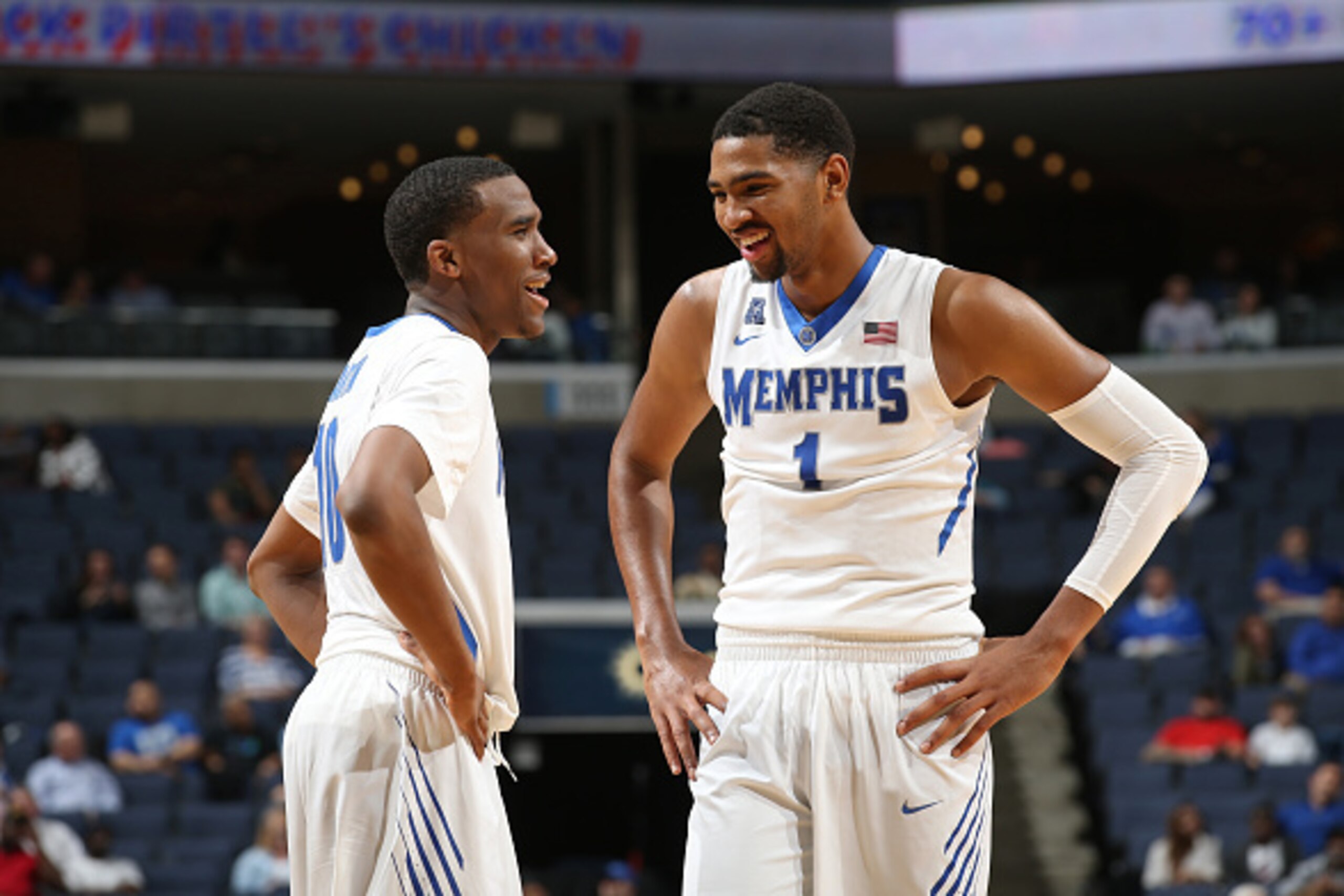 MEMPHIS, TN - NOVEMBER 6: Dedric Lawson #1 and Jeremiah Martin #10 of the Memphis Tigers laugh during a break in action against the LeMoyne-Owen Magicians on November 6, 2015 at FedExForum in Memphis, Tennessee. Memphis defeated LeMoyne Owen 107-88. (Phot