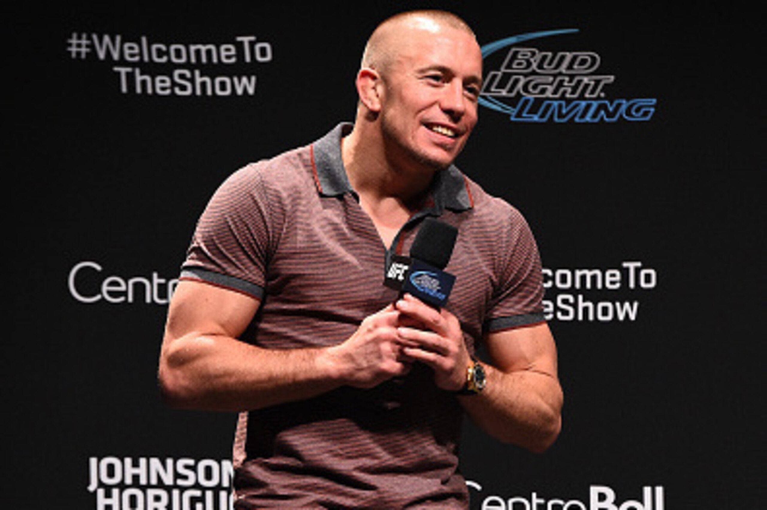 MONTREAL, QC - APRIL 24:  Former UFC welterweight champion Georges St-Pierre interacts with fans during a Q&A session before the UFC 186 weigh-in event at Metropolis on April 24, 2015 in Montreal, Quebec, Canada. (Photo by Jeff Bottari/Zuffa LLC/Zuffa LLC