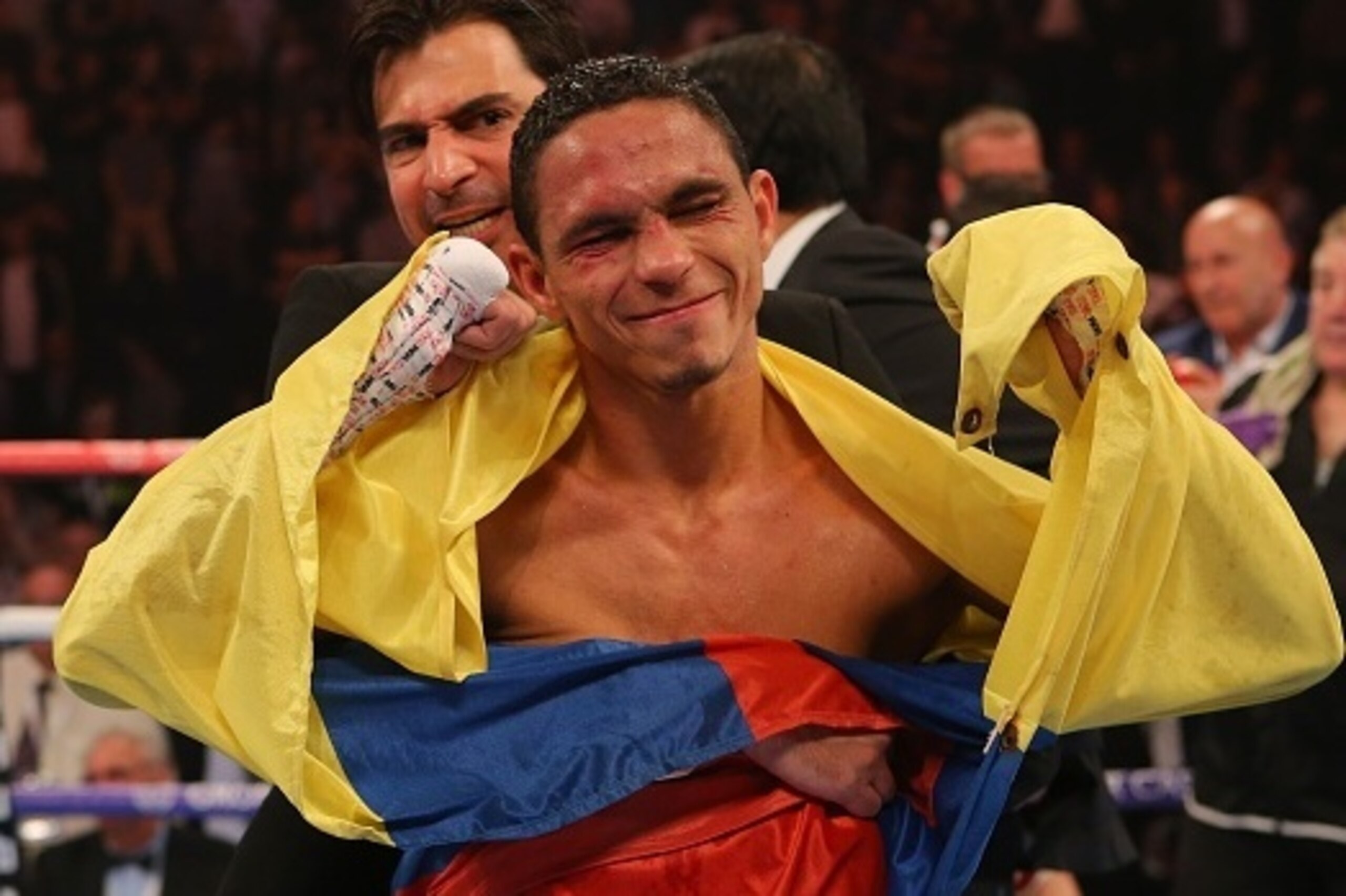 MANCHESTER, ENGLAND - JULY 18: Darleys Perez celebrates at the end of his fight against Anthony Crolla during their WBA World Lightweight Championship contest at the Manchester Arena on July 18, 2015 in Manchester, England. (Photo by Dave Thompson/Getty I