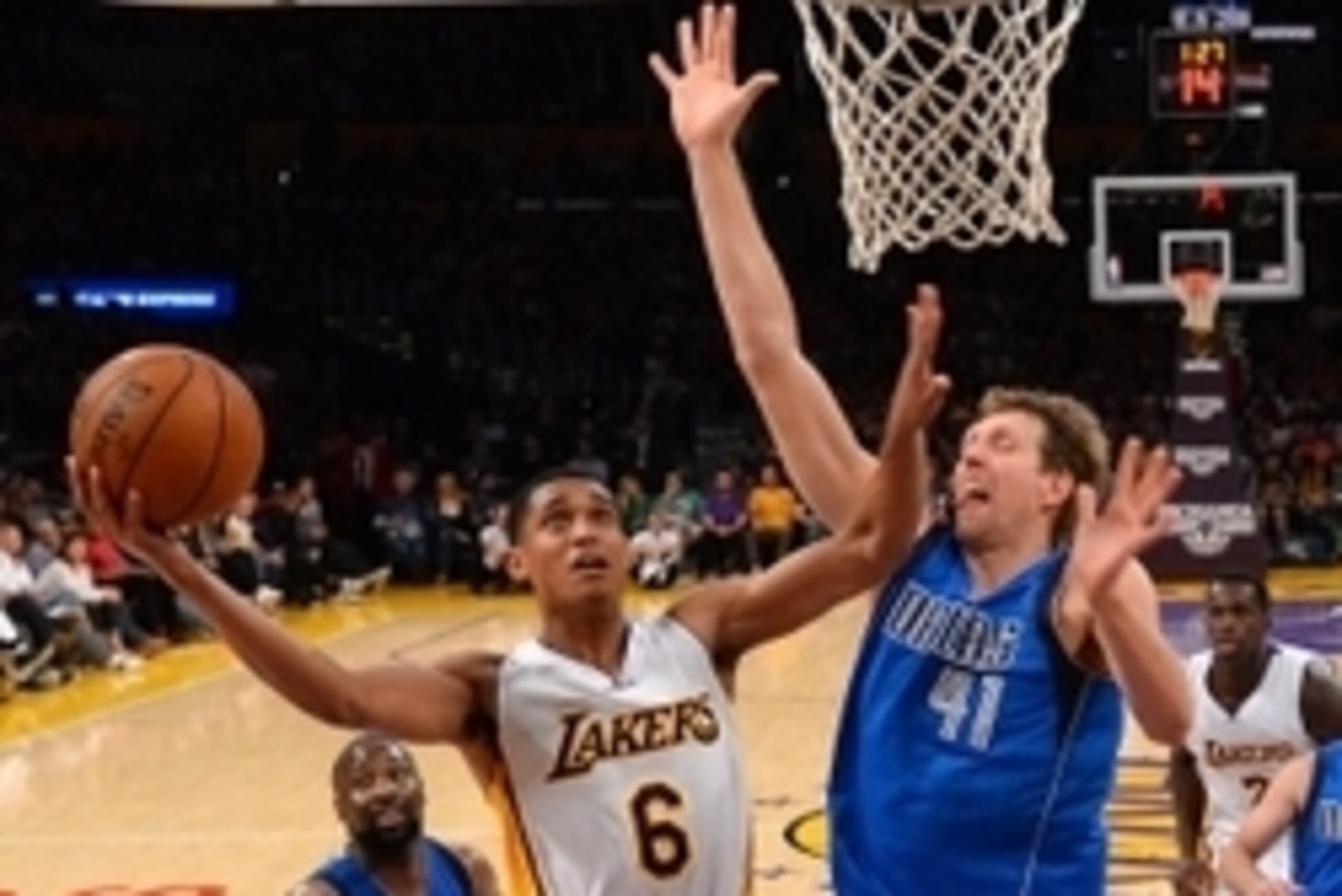 Nov 1, 2015; Los Angeles, CA, USA; Dallas Mavericks forward Dirk Nowitzki (41) defends Los Angeles Lakers guard Jordan Clarkson (6) in the second half of the game at Staples Center. Mavericks won 103-93. Mandatory Credit: Jayne Kamin-Oncea-USA TODAY Sport Nov 1, 2015; Los Angeles, CA, USA; Dallas Mavericks forward Dirk Nowitzki (41) defends Los Angeles Lakers guard Jordan Clarkson (6) in the second half of the game at Staples Center. Mavericks won 103-93. Mandatory Credit: Jayne Kamin-Oncea-USA TODAY Sport