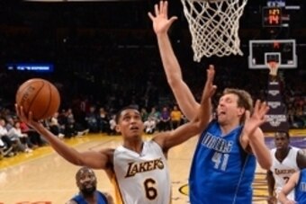 Nov 1, 2015; Los Angeles, CA, USA; Dallas Mavericks forward Dirk Nowitzki (41) defends Los Angeles Lakers guard Jordan Clarkson (6) in the second half of the game at Staples Center. Mavericks won 103-93. Mandatory Credit: Jayne Kamin-Oncea-USA TODAY Sport Nov 1, 2015; Los Angeles, CA, USA; Dallas Mavericks forward Dirk Nowitzki (41) defends Los Angeles Lakers guard Jordan Clarkson (6) in the second half of the game at Staples Center. Mavericks won 103-93. Mandatory Credit: Jayne Kamin-Oncea-USA TODAY Sport