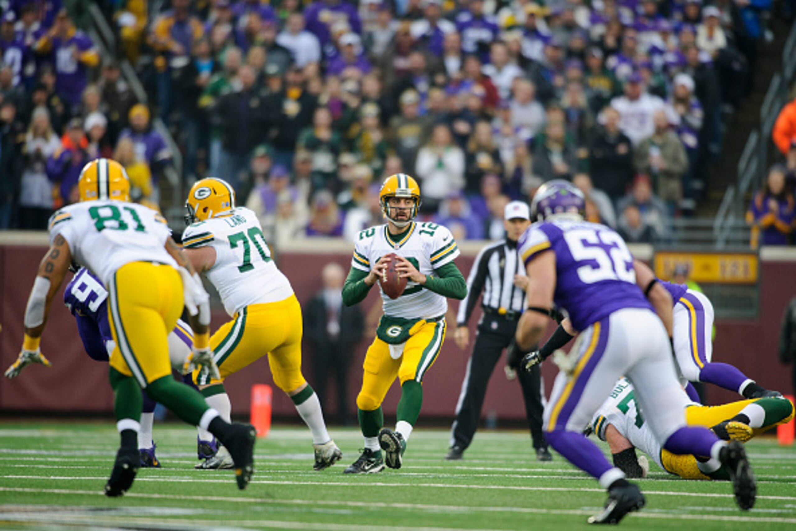 MINNEAPOLIS, MN - NOVEMBER 23: Aaron Rodgers #12 of the Green Bay Packers looks to pass the ball during the game against the Minnesota Vikings on November 23, 2014 at TCF Bank Stadium in Minneapolis, Minnesota. The Packers defeated the Vikings 24-21. (Pho