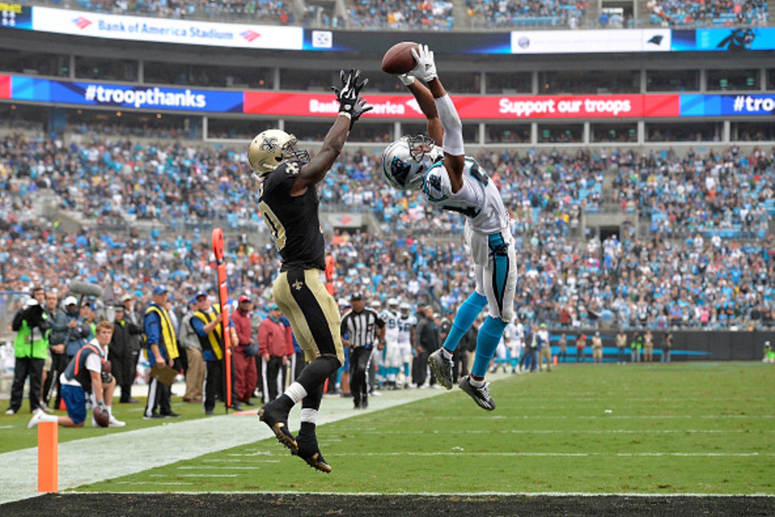 CHARLOTTE, NC - SEPTEMBER 27:  Josh Norman #24 of the Carolina Panthers makes a game-saving interception of a pass to Brandin Cooks #10 of the New Orleans Saints in the end zone during their game at Bank of America Stadium on September 27, 2015 in Charlot