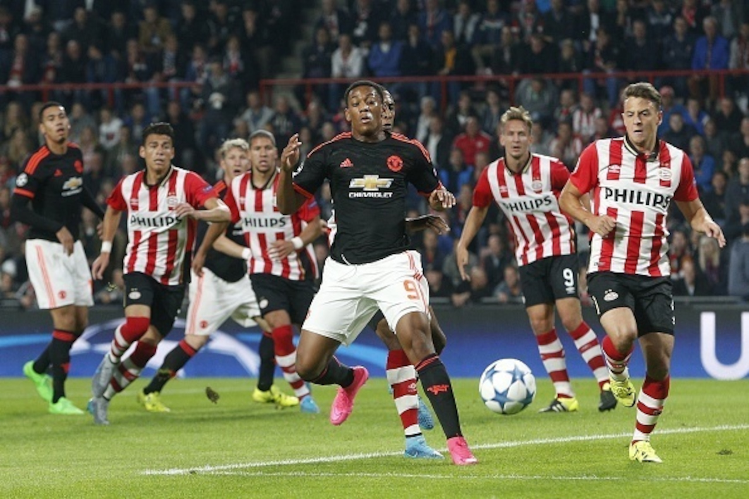 Anthony Martial of Manchester United FC (C), Santiago Arias of PSV (R) during the UEFA Champions League group B match between PSV Eindhoven and Manchester United on September 15, 2015 at the Philips stadium in Eindhoven, The Netherlands.(Photo by VI Image