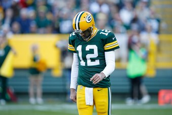 GREEN BAY, WI - NOVEMBER 15: Aaron Rodgers #12 of the Green Bay Packers reacts with disgust as he comes off the field against the Detroit Lions during a game at Lambeau Field on November 15, 2015 in Green Bay, Wisconsin. The Lions defeated the Packers 18-