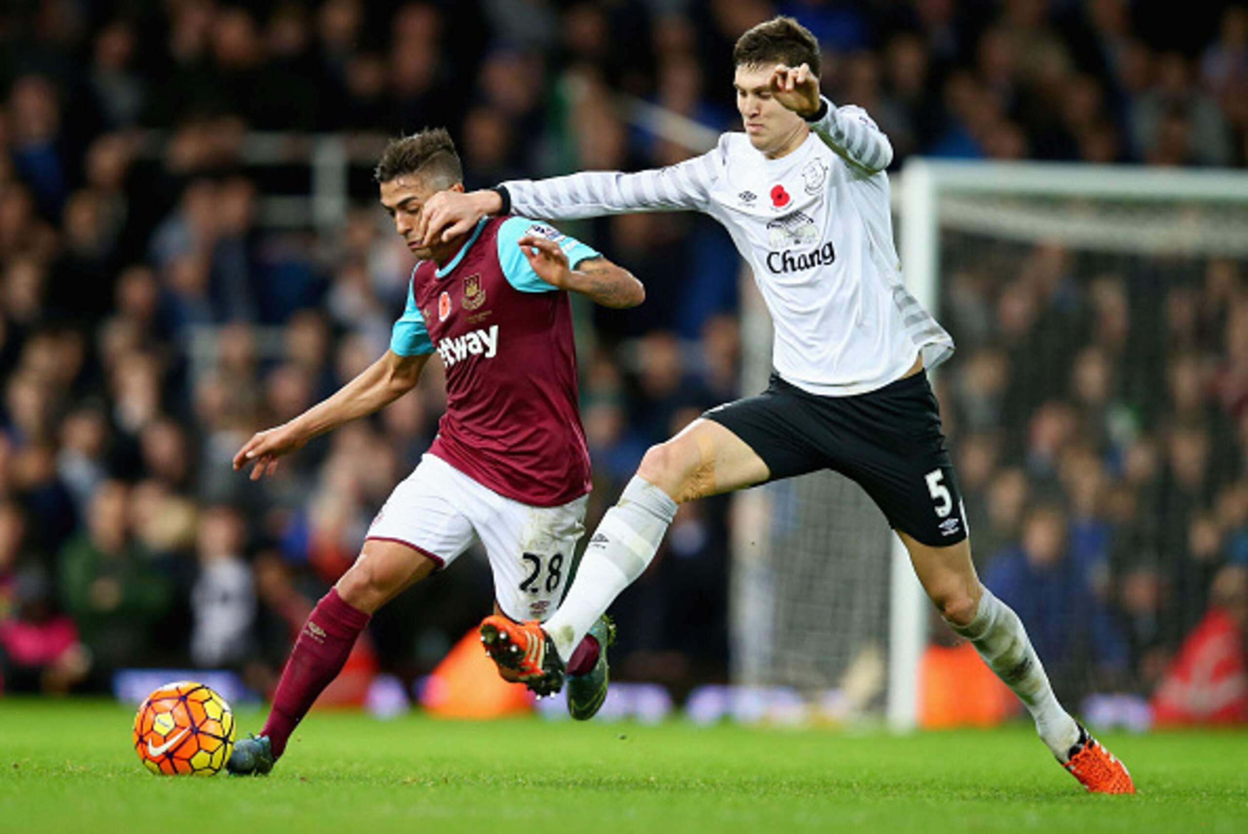 LONDON, ENGLAND - NOVEMBER 07: Manuel Lanzini of West Ham United and John Stones of Everton compete for the ball during the Barclays Premier League match between West Ham United and Everton at Boleyn Ground on November 7, 2015 in London, England.  (Photo 