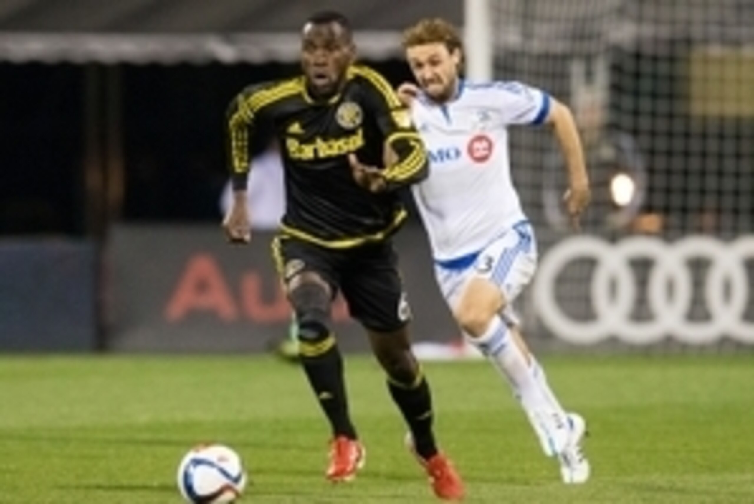 Nov 8, 2015; Columbus, OH, USA; Columbus Crew SC midfielder Tony Tchani (6) advances the ball under pressure from Montreal Impact midfielder Marco Donadel (33) during the MLS Playoffs at Mapfre Stadium. Crew SC won the series 4-3 on aggregate. Mandatory C Nov 8, 2015; Columbus, OH, USA; Columbus Crew SC midfielder Tony Tchani (6) advances the ball under pressure from Montreal Impact midfielder Marco Donadel (33) during the MLS Playoffs at Mapfre Stadium. Crew SC won the series 4-3 on aggregate. Mandatory C