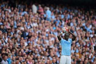 MANCHESTER, ENGLAND - AUGUST 16:  Bacary Sagna of Manchester City takes a throw in during the Barclays Premier League match between Manchester City and Chelsea at the Etihad Stadium on August 16, 2015 in Manchester, England.  (Photo by Matthew Ashton - AM