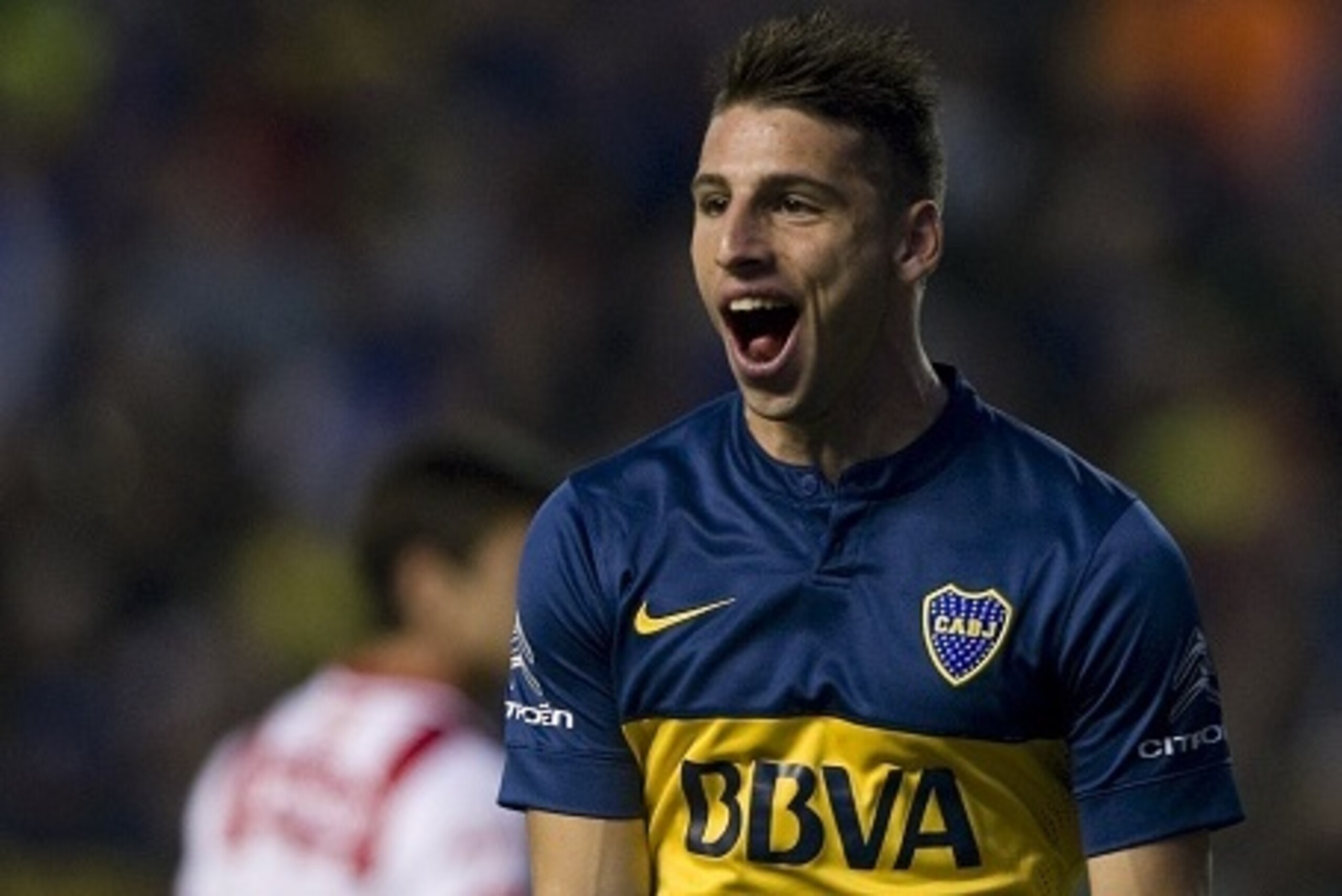 Boca Juniors' forward Jonathan Calleri (R) celebrates after scoring against Union during their Argentina First Division footbal match, at La Bombonera stadium, on August 2, 2015.  AFP PHOTO/ALEJANDRO PAGNI        (Photo credit should read ALEJANDRO PAGNI/