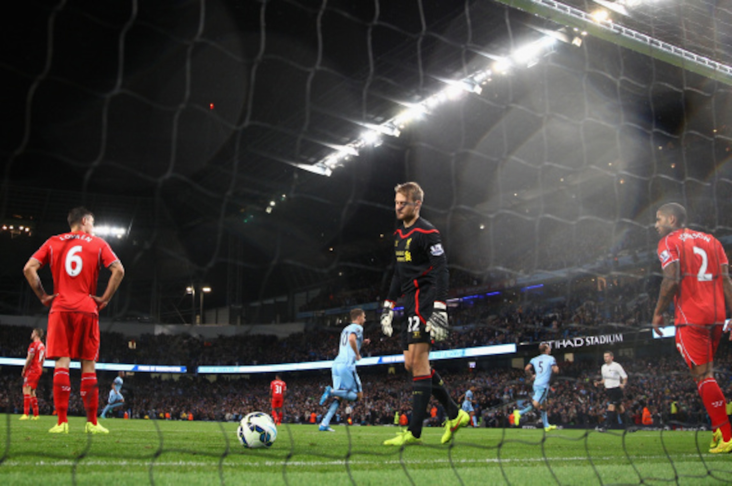 MANCHESTER, ENGLAND - AUGUST 25:   Simon Mignolet of Liverpool looks dejected after conceding the second goal during the Barclays Premier League match between Manchester City and Liverpool at the Etihad Stadium on August 25, 2014 in Manchester, England.  