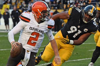 PITTSBURGH, PA - NOVEMBER 15:  Defensive lineman Stephon Tuitt #91 of the Pittsburgh Steelers pursues quarterback Johnny Manziel #2 of the Cleveland Browns during a game at Heinz Field on November 15, 2015 in Pittsburgh, Pennsylvania.  The Steelers defeat