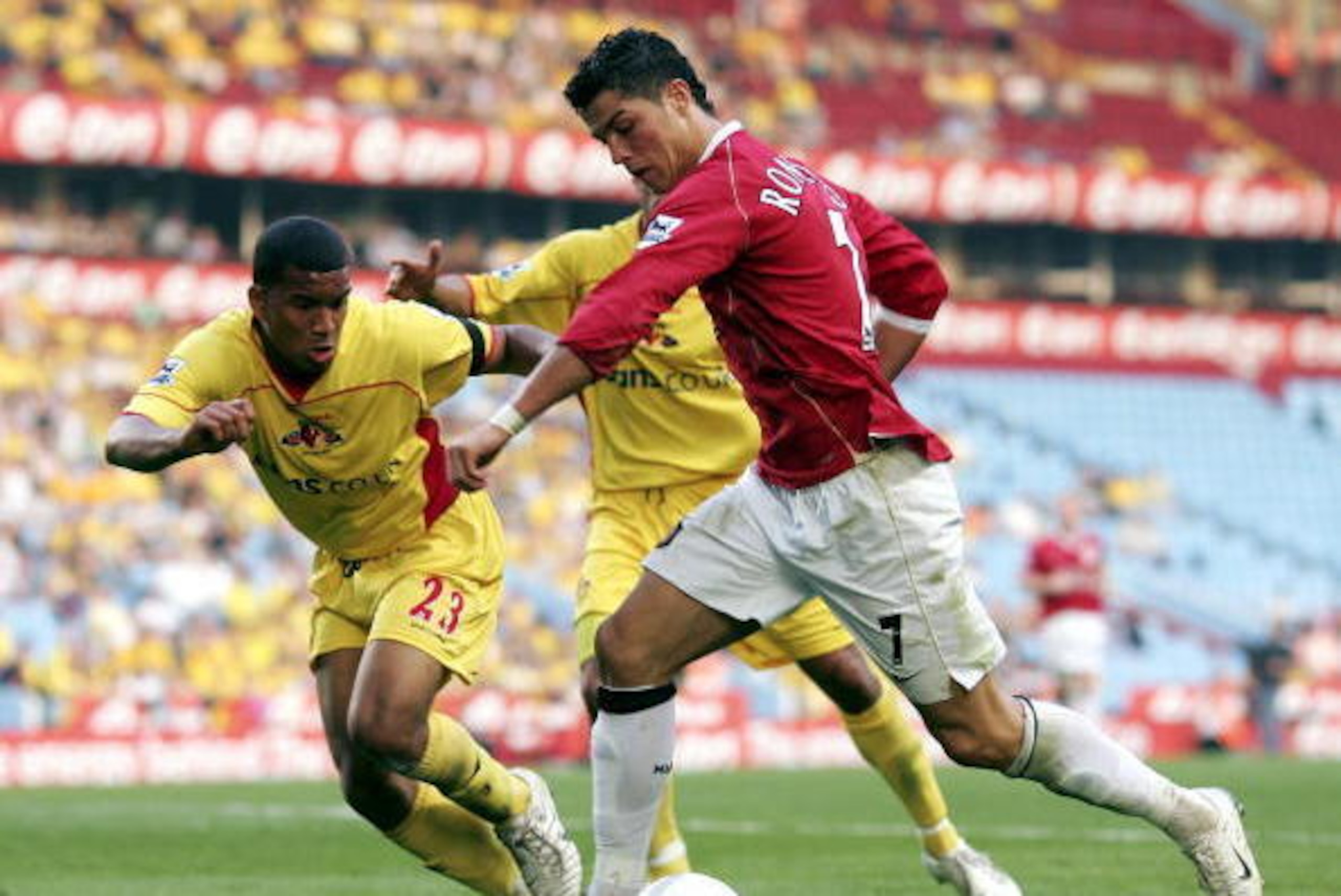 BIRMINGHAM, UNITED KINGDOM - APRIL 14: Cristiano Ronaldo of Manchester United runs past Adrian Mariappa of Watford during the FA Cup Semi Final sponsored by E.ON between Watford and Manchester United at Villa Park on April 14, 2007 in Birmingham, England BIRMINGHAM, UNITED KINGDOM - APRIL 14: Cristiano Ronaldo of Manchester United runs past Adrian Mariappa of Watford during the FA Cup Semi Final sponsored by E.ON between Watford and Manchester United at Villa Park on April 14, 2007 in Birmingham, England