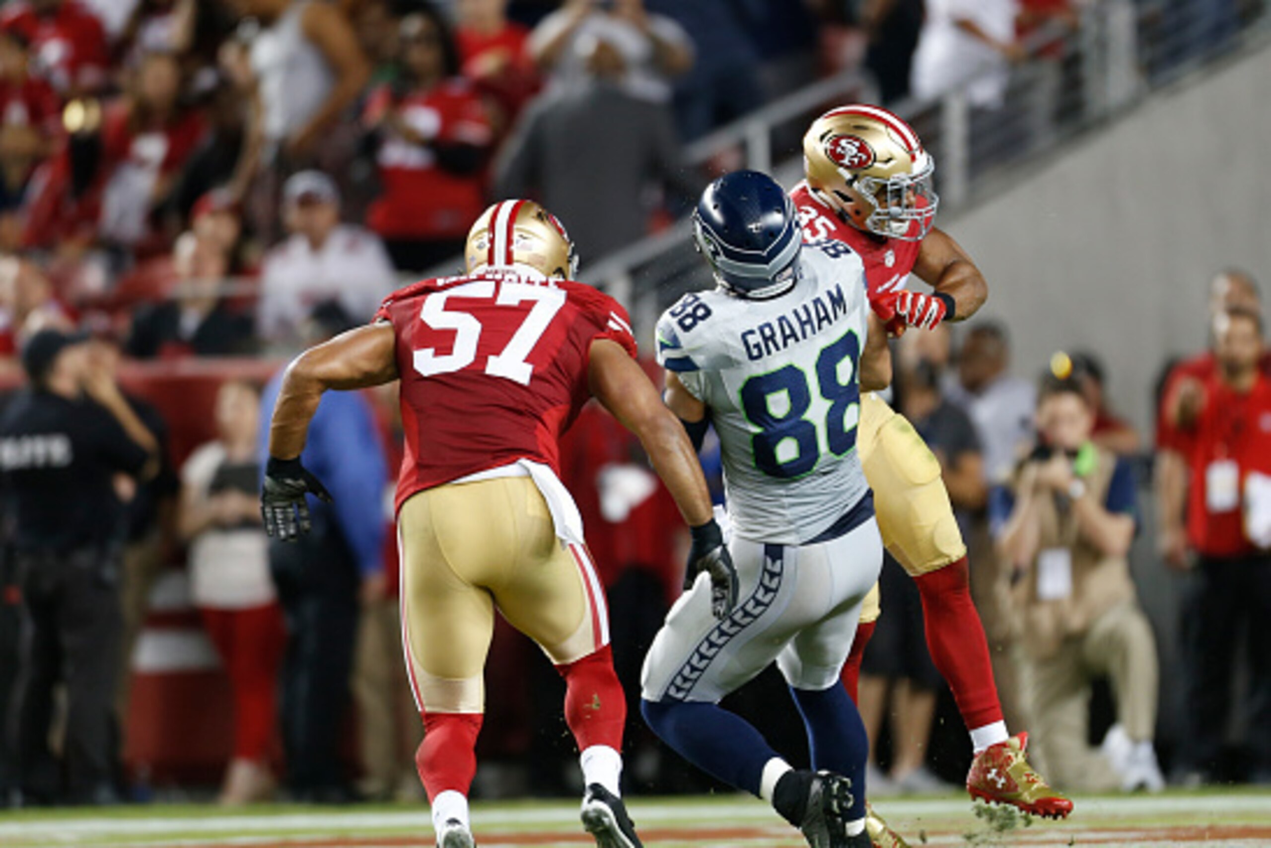 SANTA CLARA, CA - OCTOBER 22: Eric Reid #35 of the San Francisco 49ers lays a big hit on Jimmy Graham #88 of the Seattle Seahawks, to break up a pass, during the game at Levi Stadium on October 22, 2015 in Santa Clara, California. The Seahawks defeated th