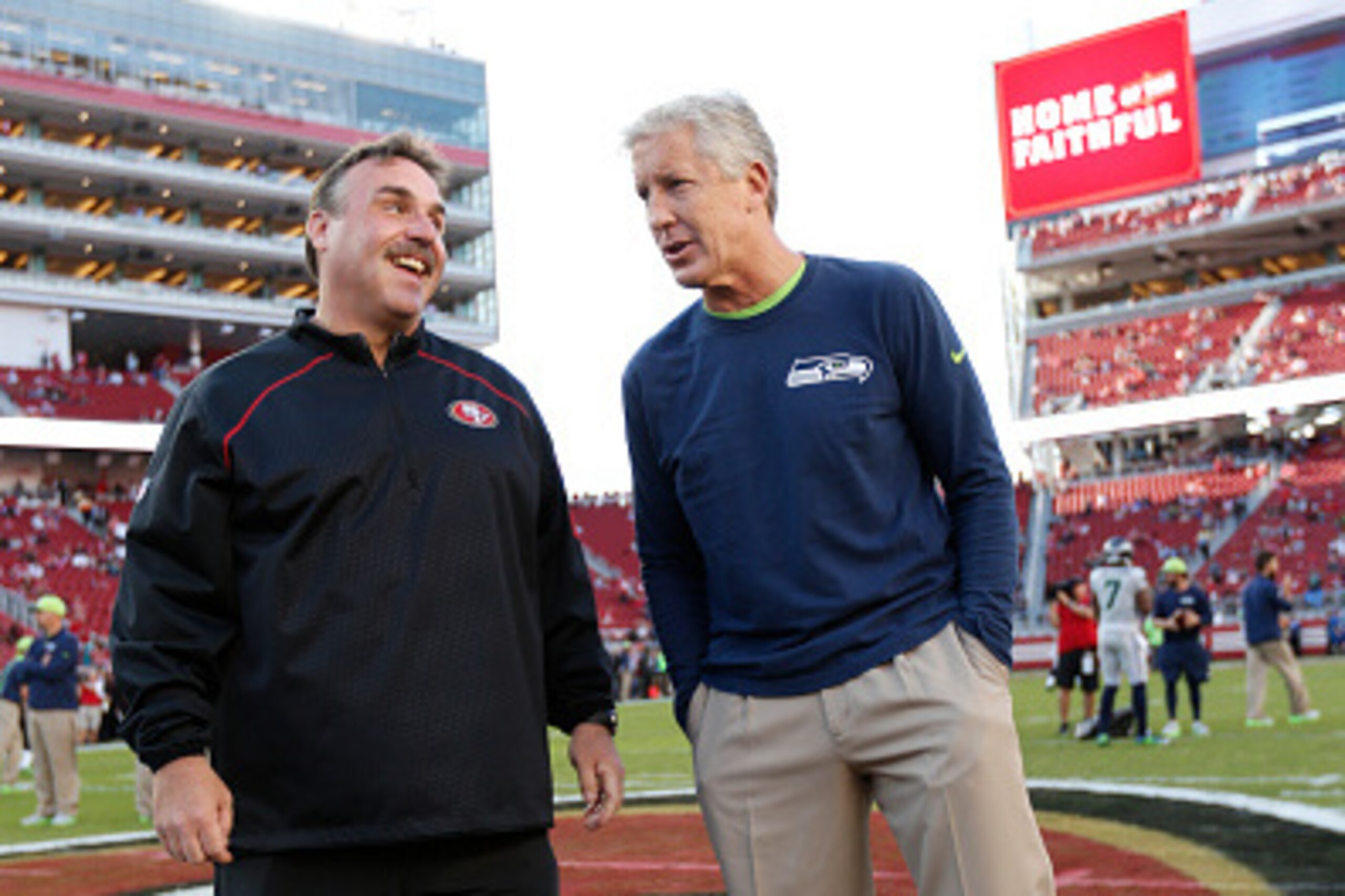 SANTA CLARA, CA - OCTOBER 22: Head Coach Jim Tomsula of the San Francisco 49ers and Head Coach Pete Carroll of the Seattle Seahawks talk on the field prior to the game at Levi Stadium on October 22, 2015 in Santa Clara, California. The Seahawks defeated t