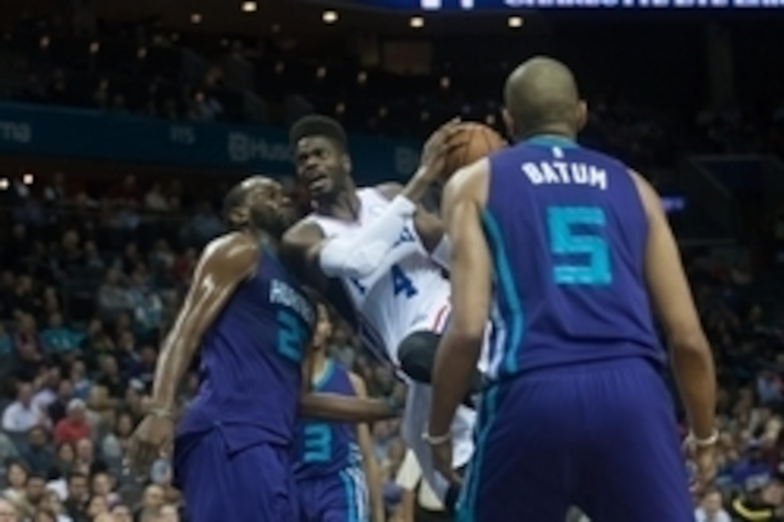 Nov 20, 2015; Charlotte, NC, USA; Philadelphia 76ers forward Nerlens Noel (4) goes up for a shot against Charlotte Hornets center Al Jefferson (25) during the first half at Time Warner Cable Arena. Mandatory Credit: Jeremy Brevard-USA TODAY Sports