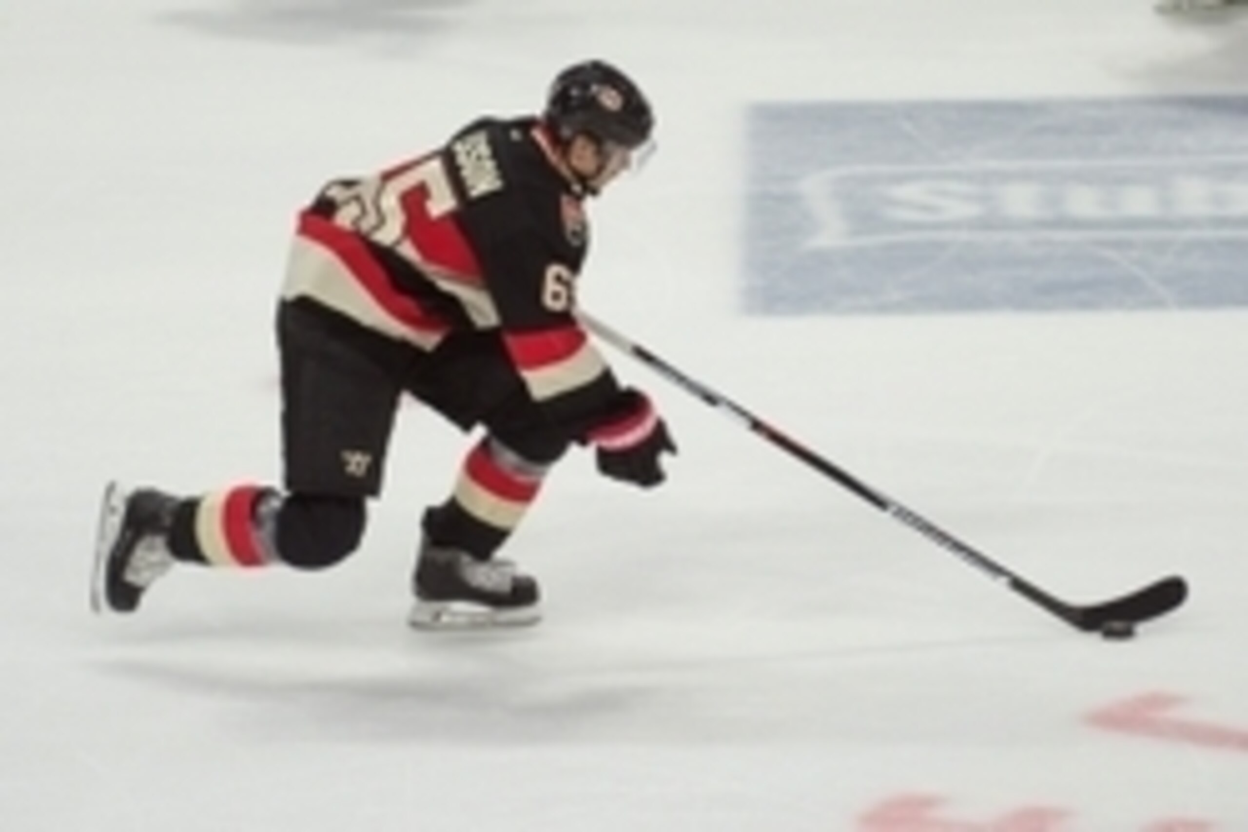 Nov 19, 2015; Ottawa, Ontario, CAN; Ottawa Senators defenseman Erik Karlsson (65) skates with the puck in the third period against the Columbus Blue Jackets  at Canadian Tire Centre. The Senators defeated the Blue Jackets 3-0. Mandatory Credit: Marc DesRo
