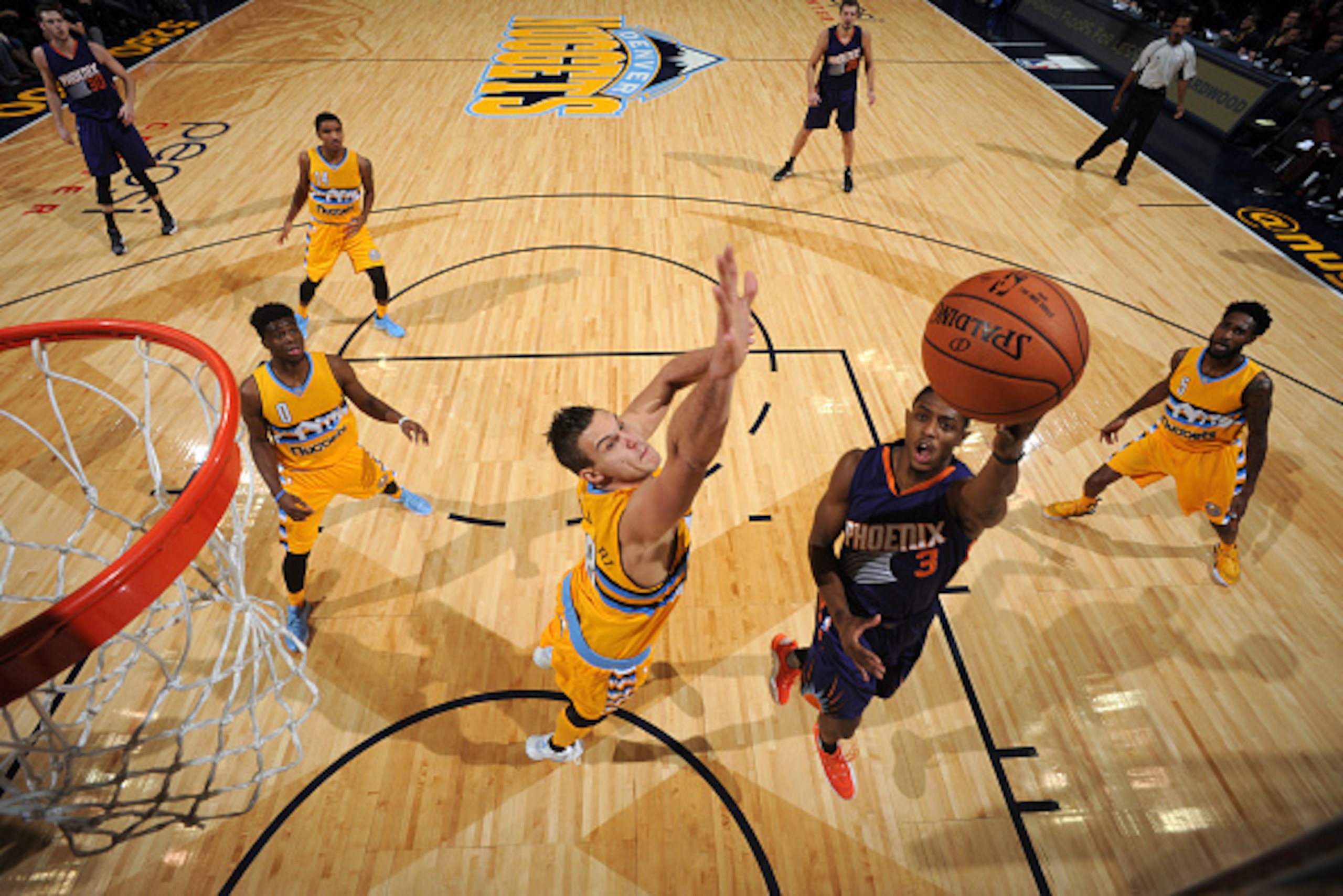 DENVER, CO - NOVEMBER 20:  Brandon Knight #3 of the Phoenix Suns goes to the basket against the Denver Nuggets on November 20, 2015 at the Pepsi Center in Denver, Colorado. NOTE TO USER: User expressly acknowledges and agrees that, by downloading and/or u